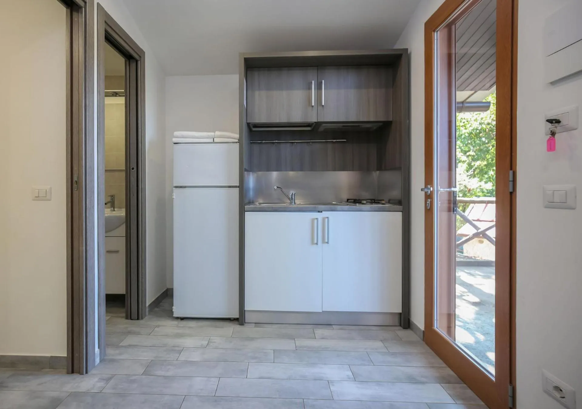 Kitchen or kitchenette in Village Camping Santa Fortunata - Campogaio