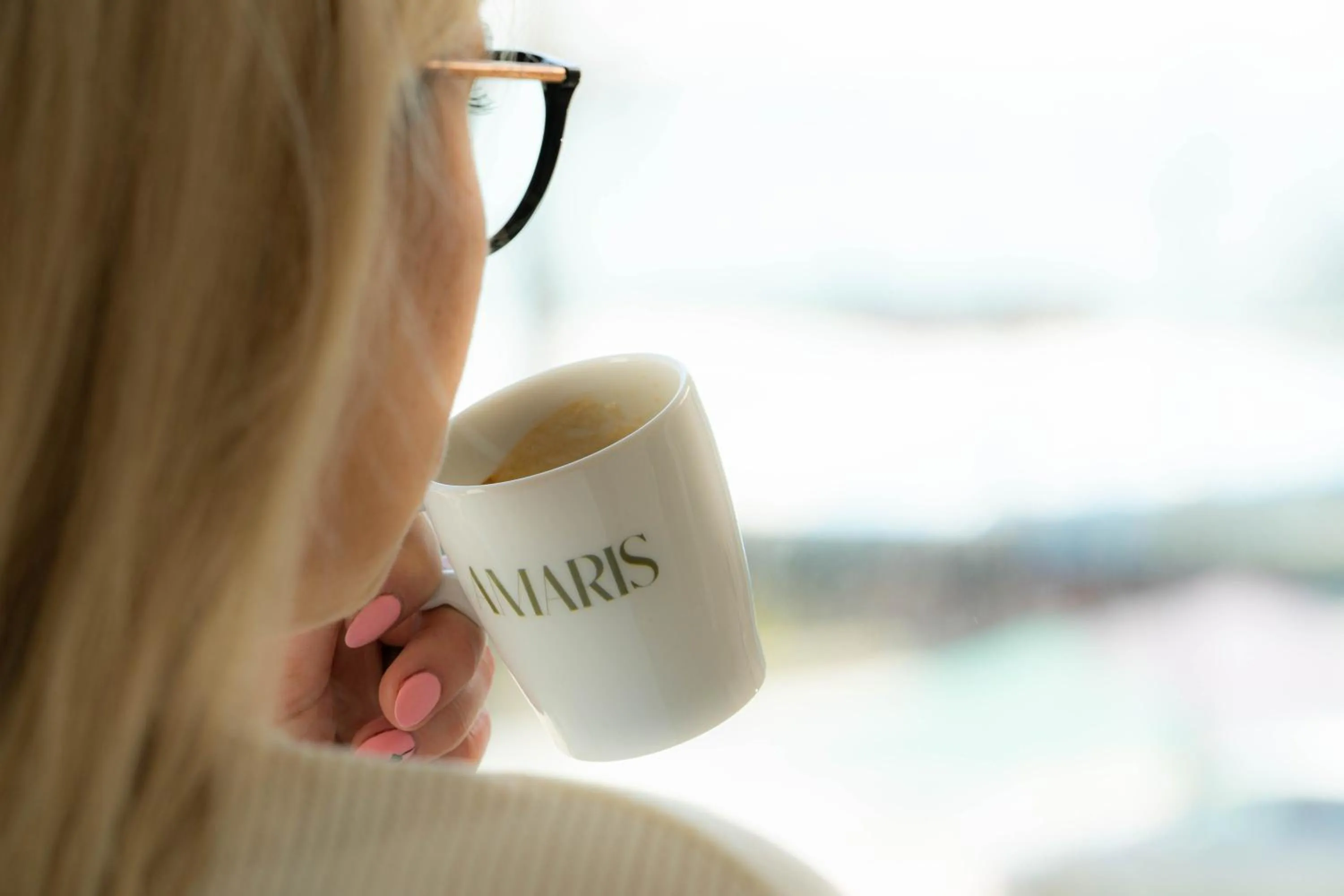 Property logo or sign in Amaris ApartHotel la 2 Pași de Plajă & Parcare Gratuită