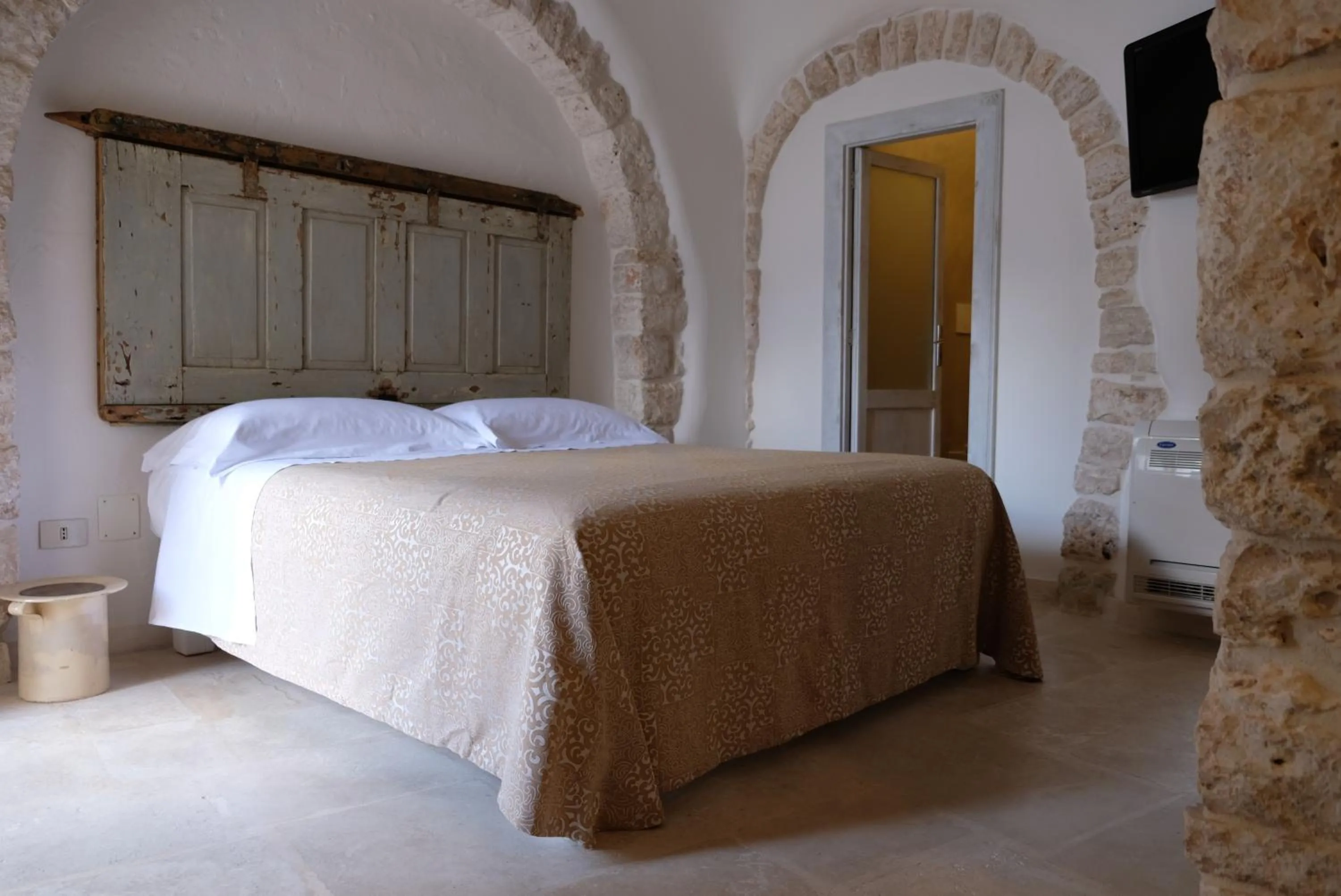 Bedroom, Bed in Trulli Holiday Albergo Diffuso