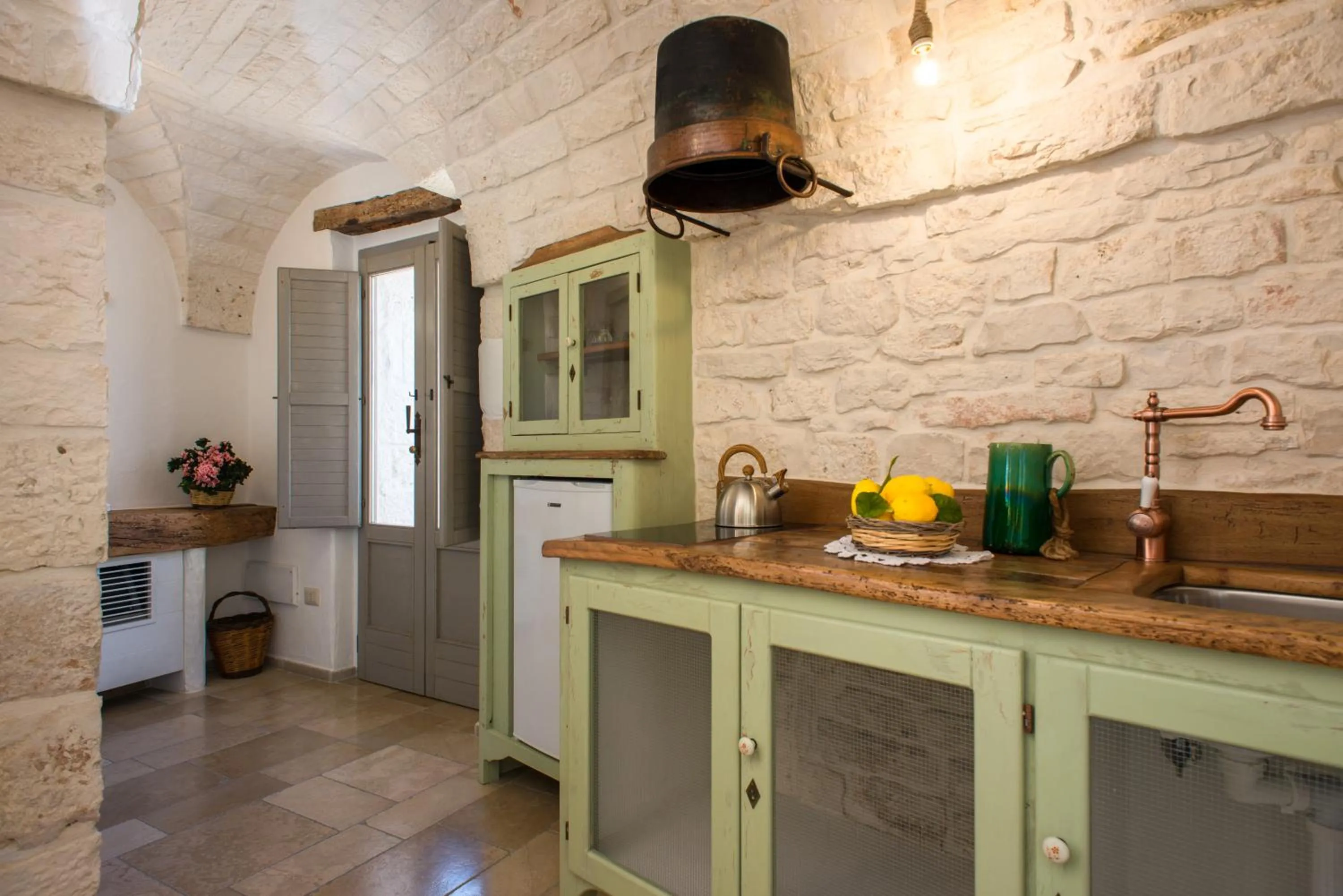 Kitchen or kitchenette in Trulli Holiday Albergo Diffuso