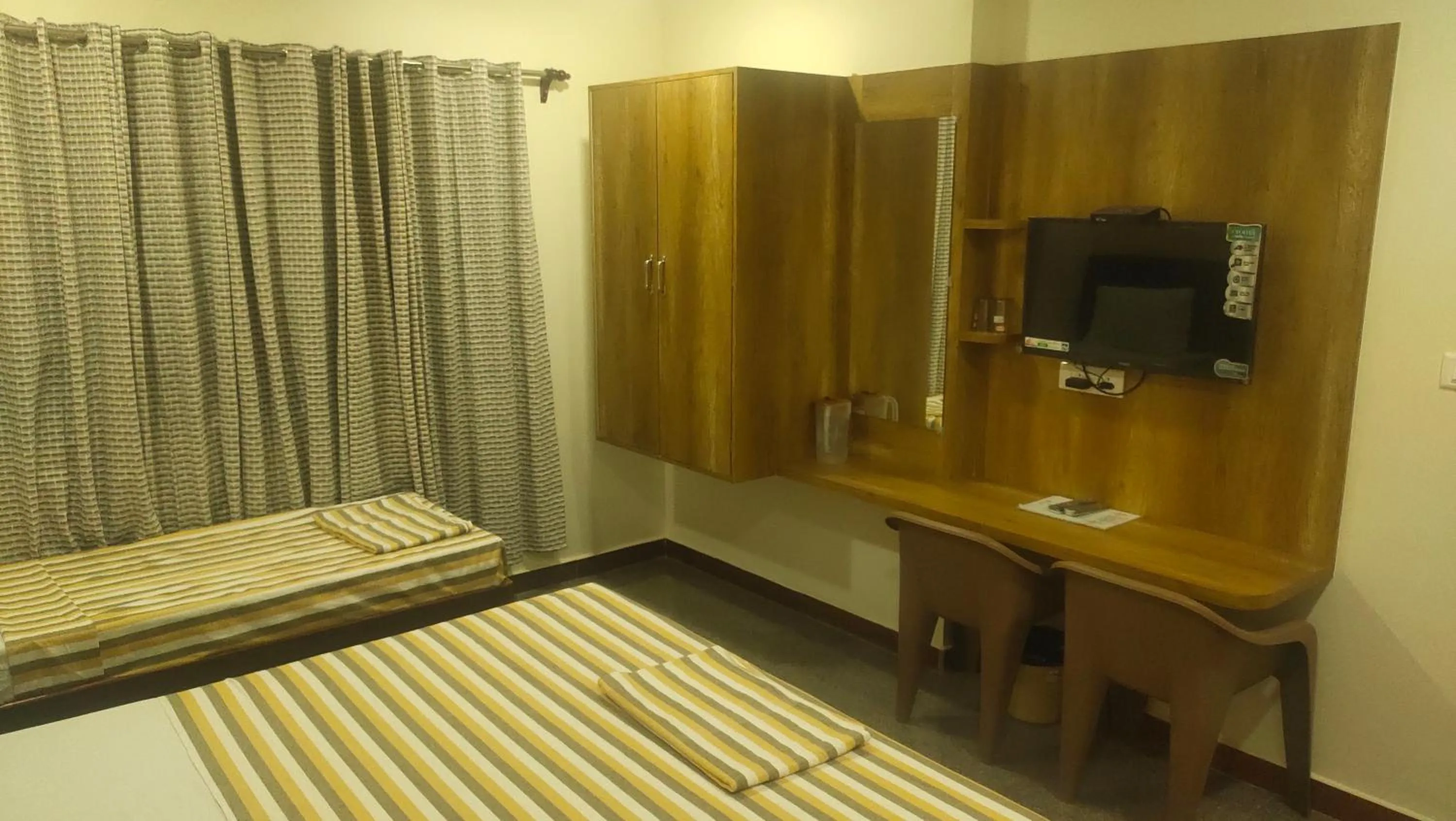 TV and multimedia, Bed in Hotel Grand Stay