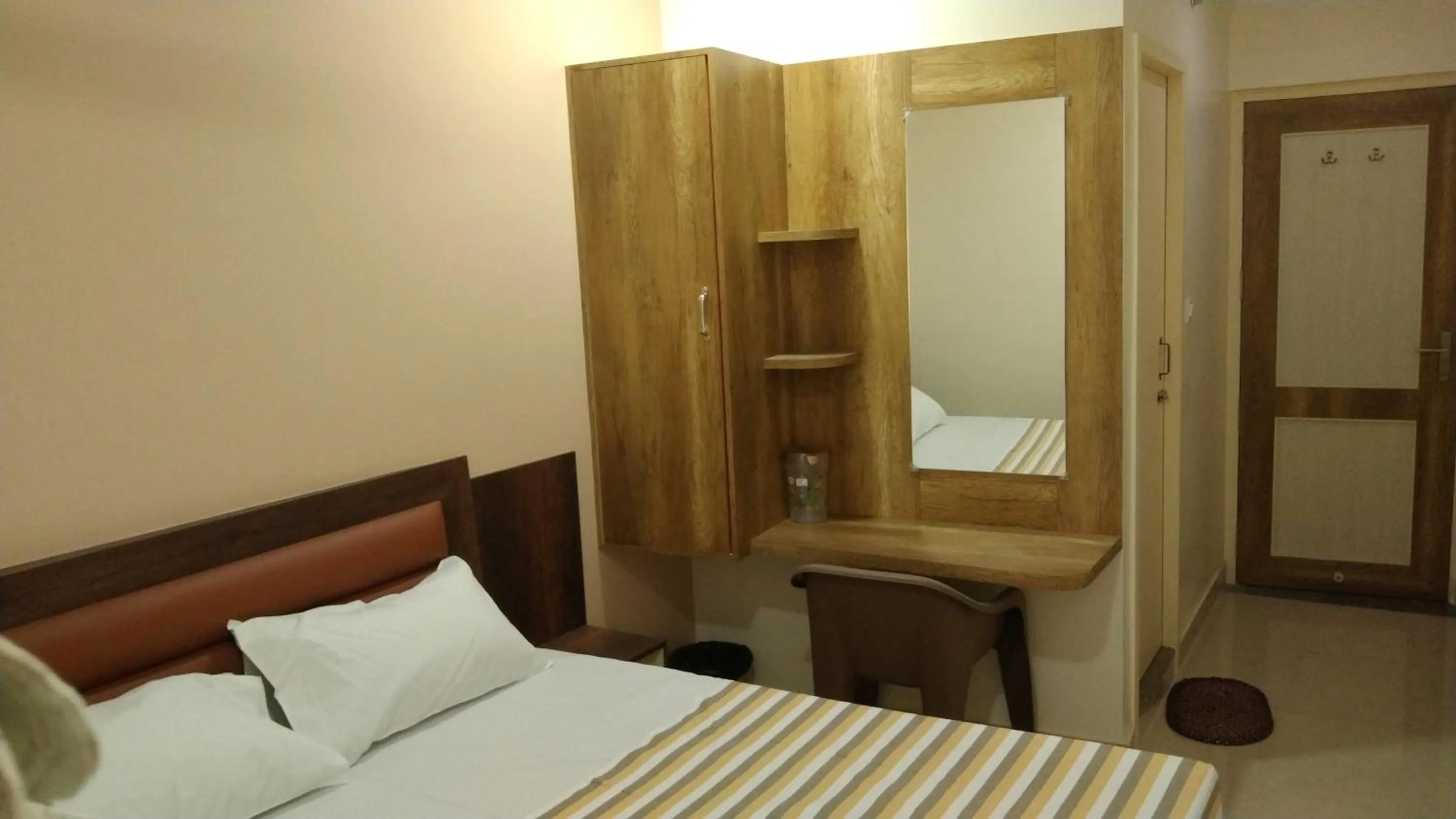 Bed in Hotel Grand Stay