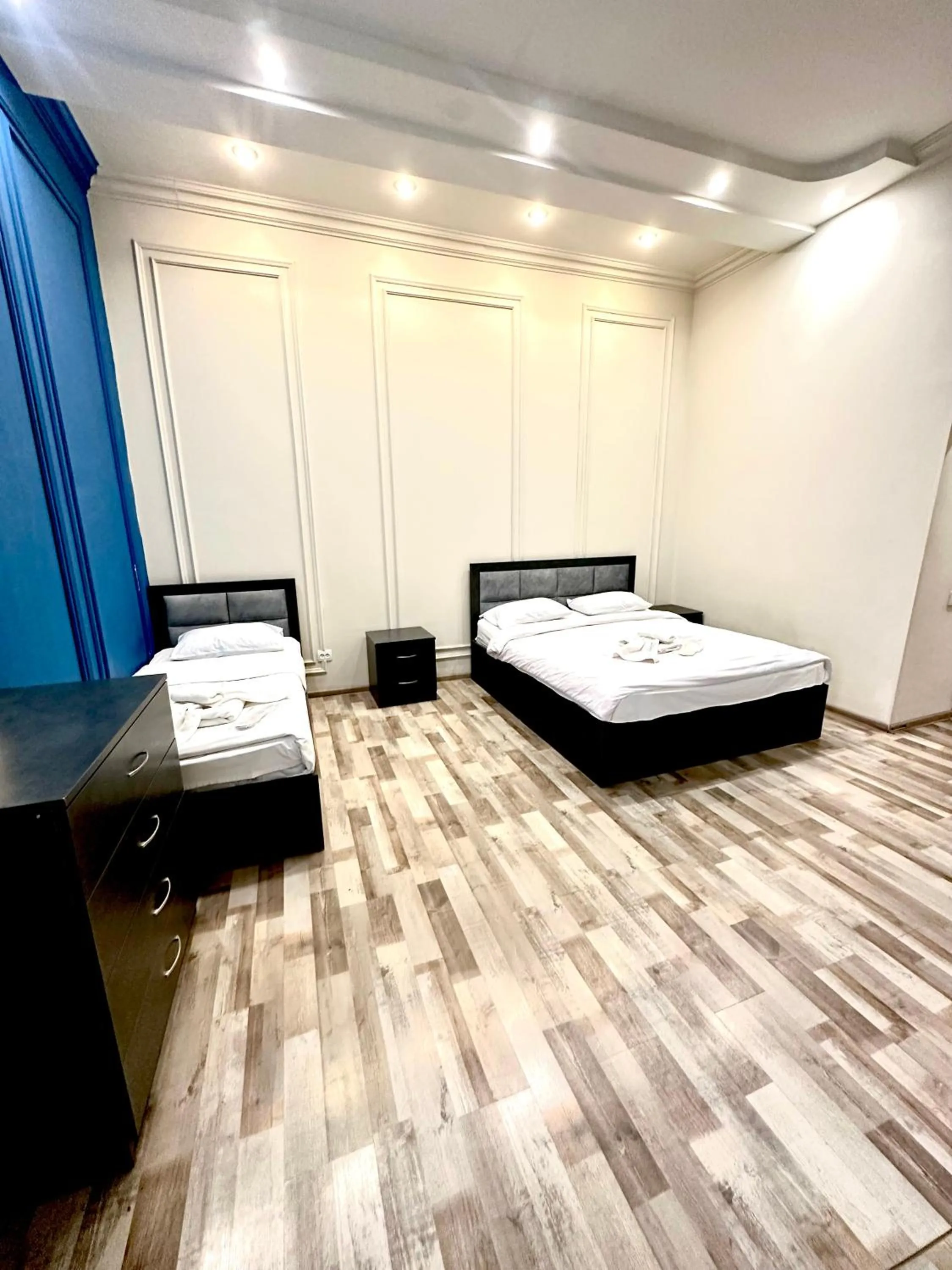 Bed in NEW BELLA HOTEL