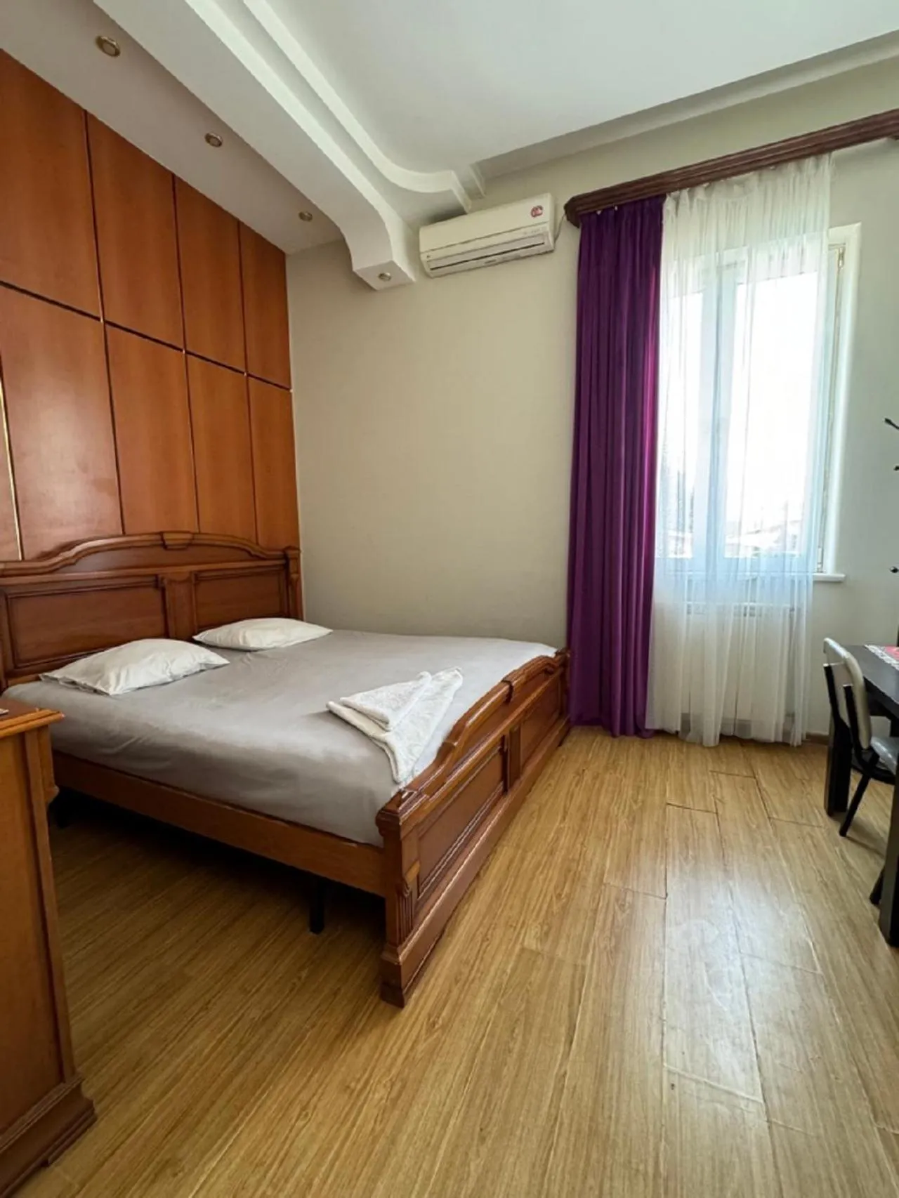 Bed in NEW BELLA HOTEL