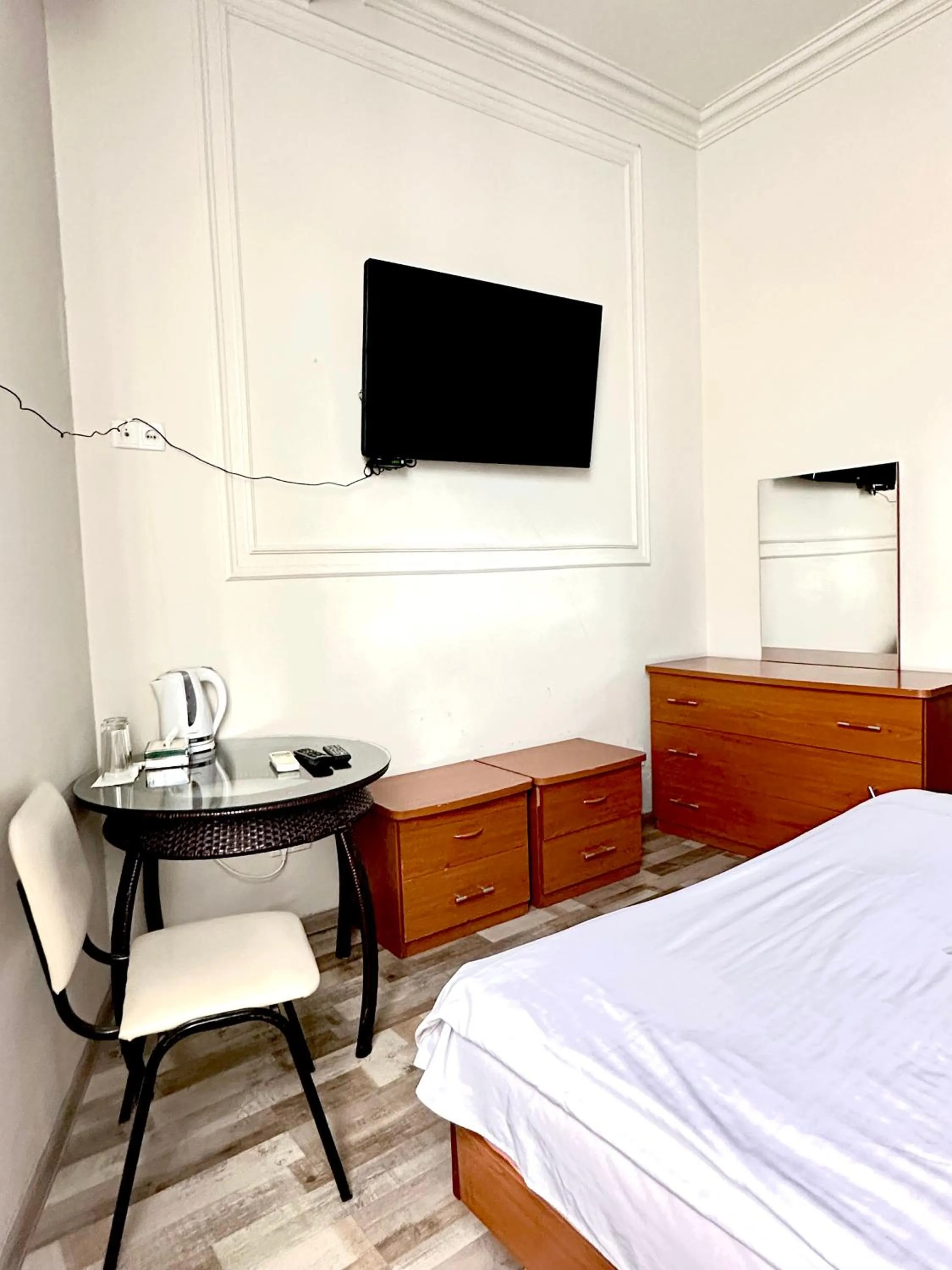 Bed in NEW BELLA HOTEL