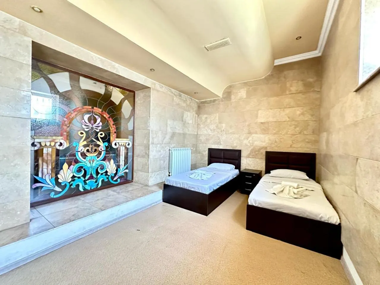 Bed in NEW BELLA HOTEL