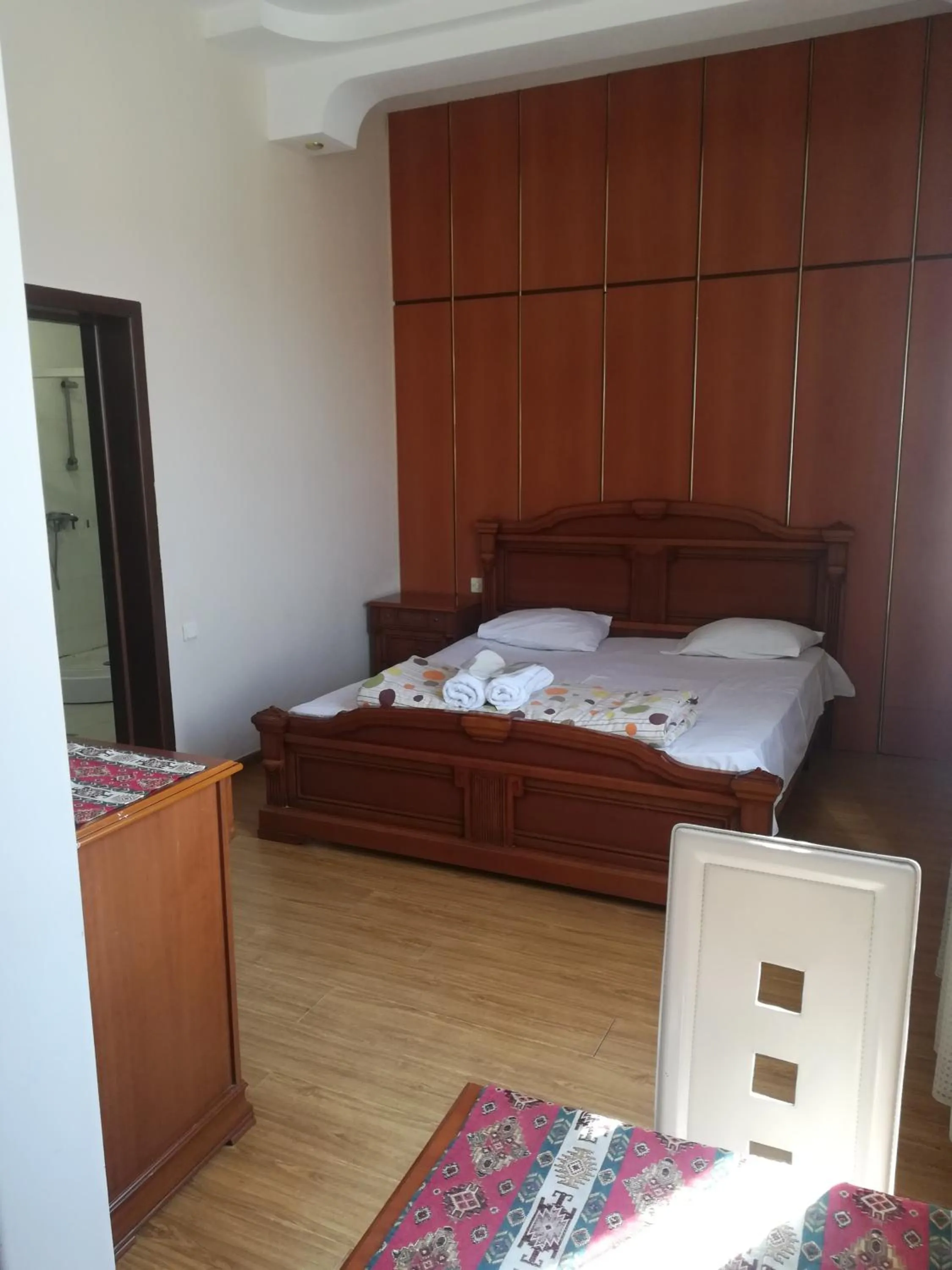 Bed in NEW BELLA HOTEL