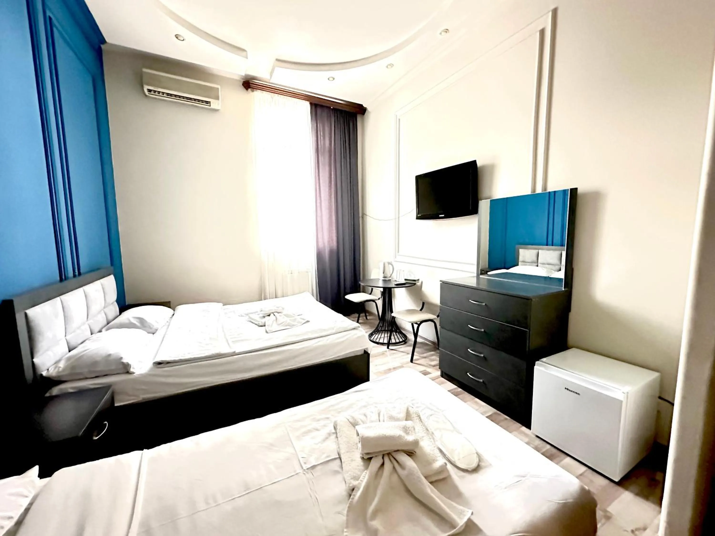 Bed in NEW BELLA HOTEL