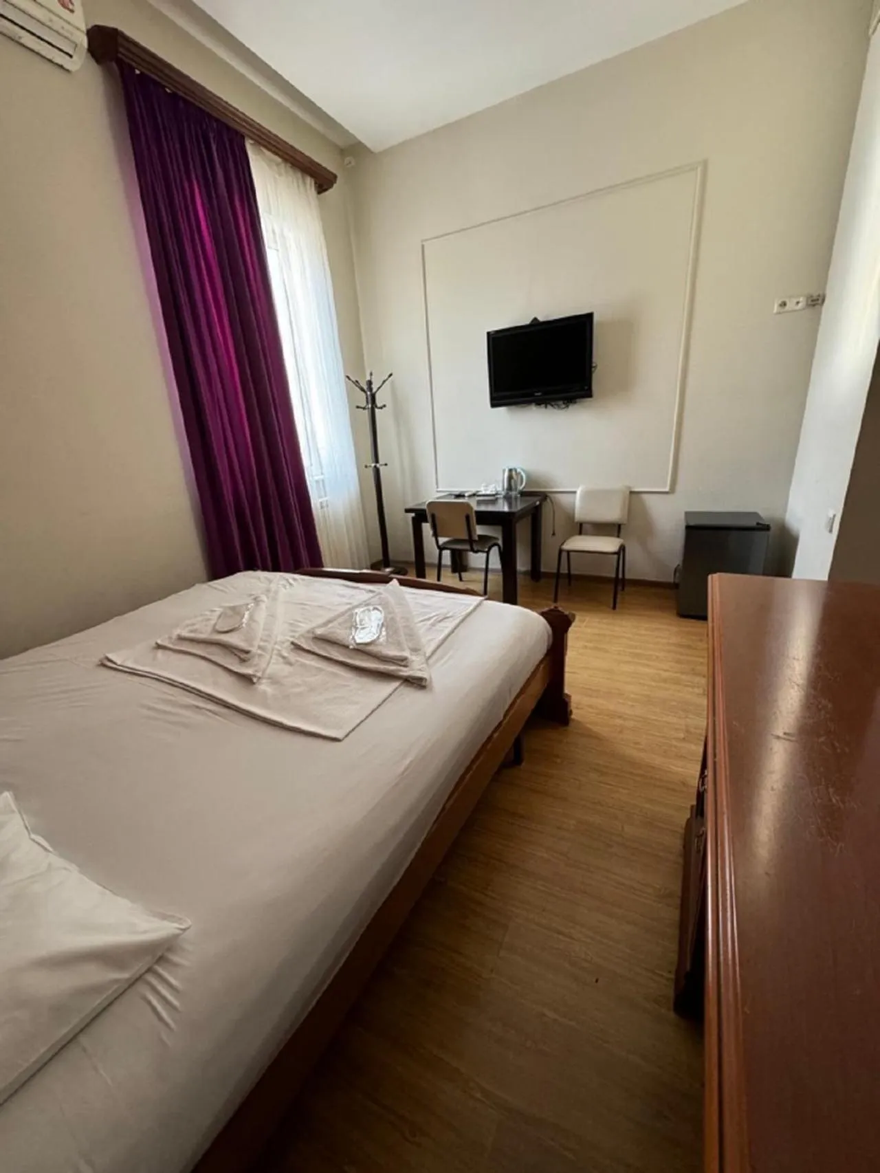 Bed in NEW BELLA HOTEL