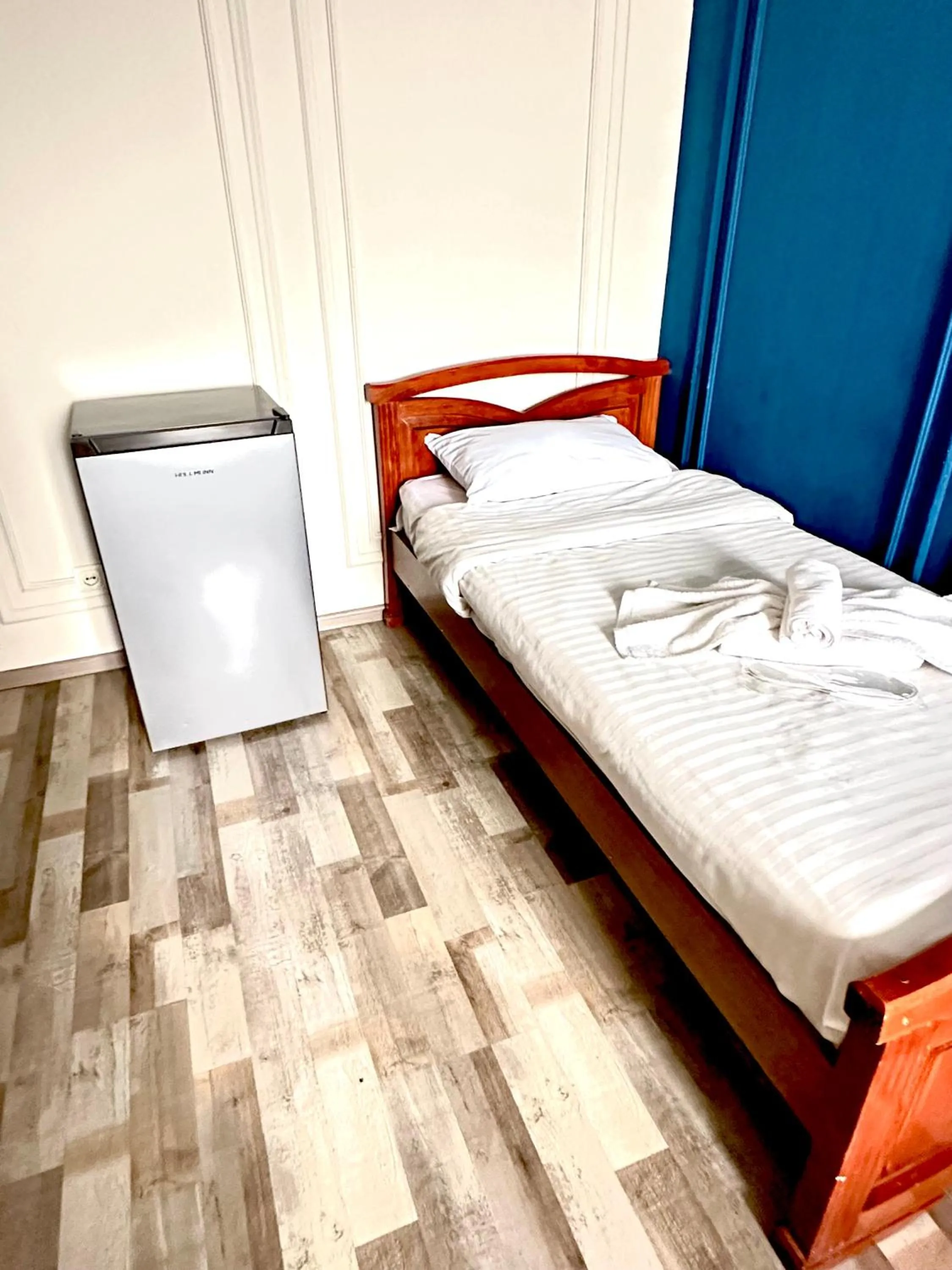 Bed in NEW BELLA HOTEL