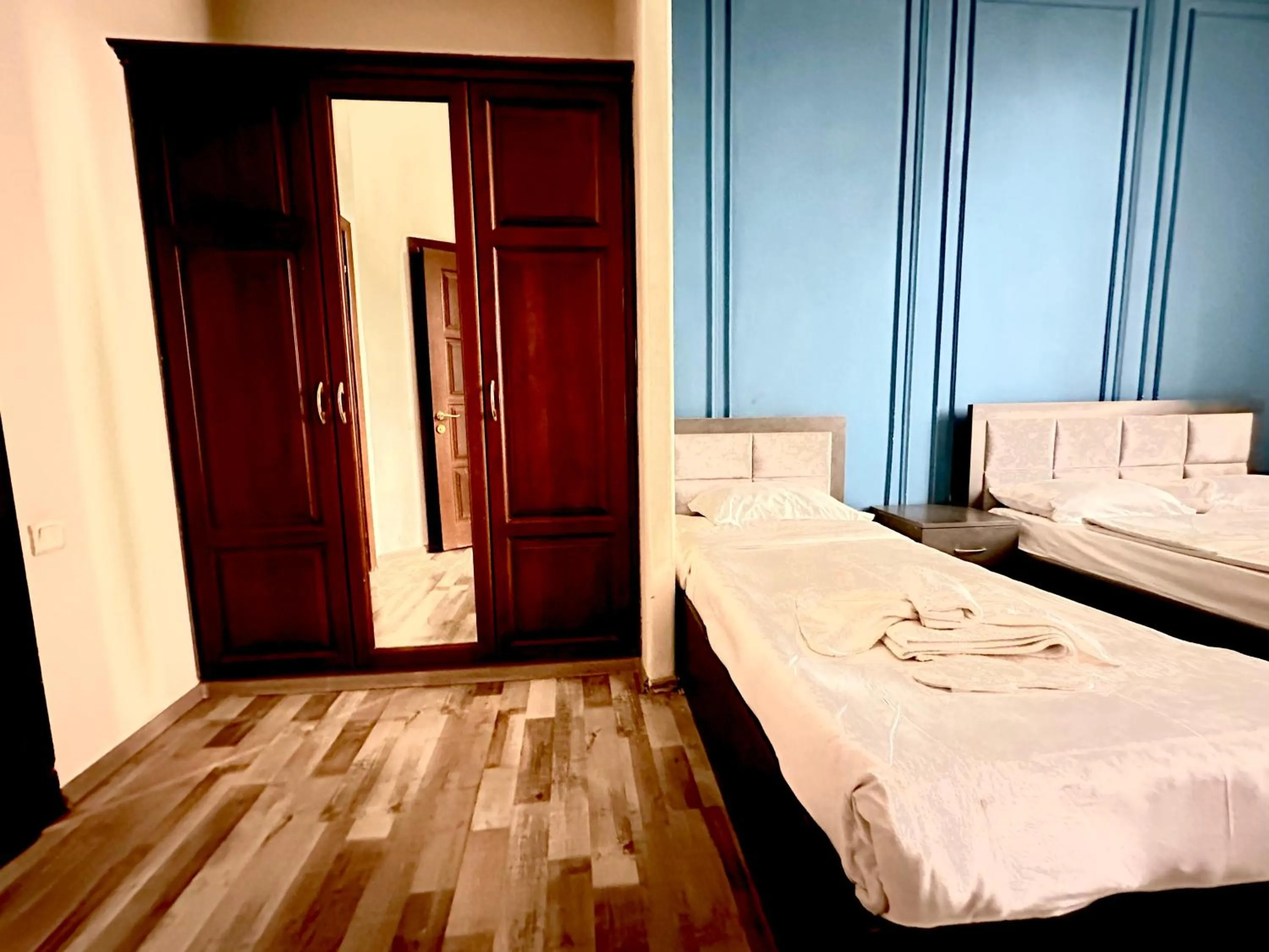 Bed in NEW BELLA HOTEL