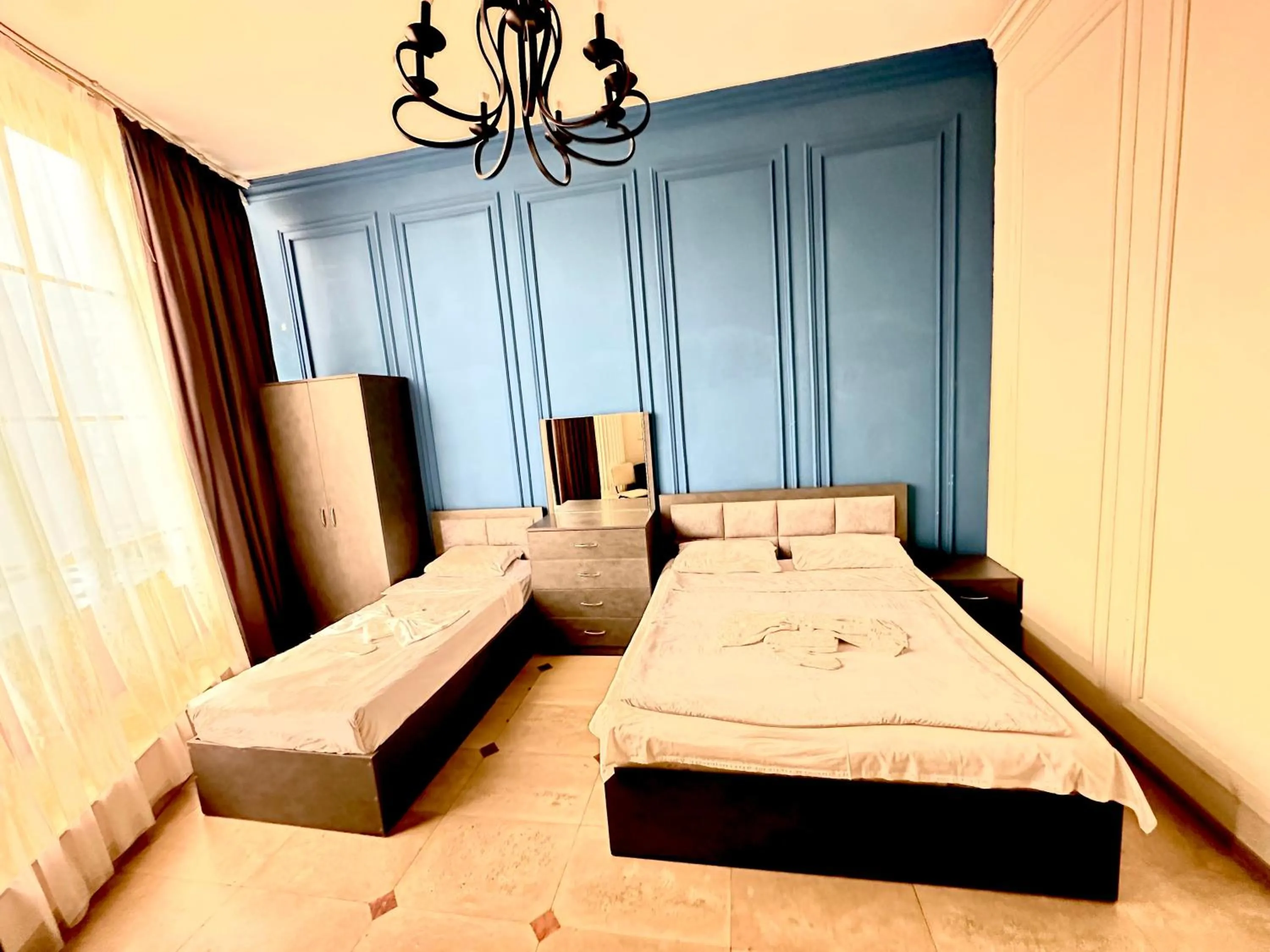 Bed in NEW BELLA HOTEL