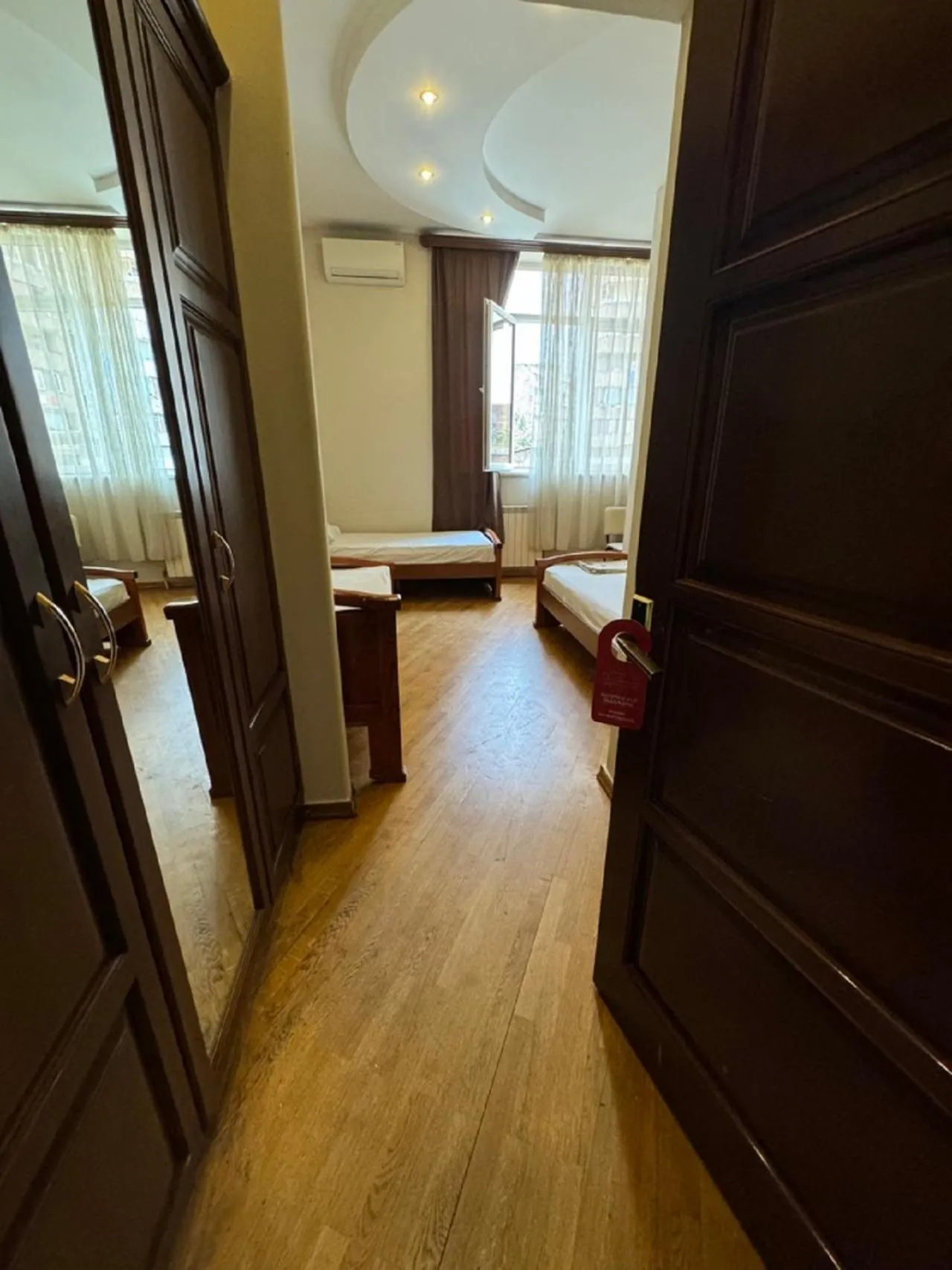 Bed in NEW BELLA HOTEL