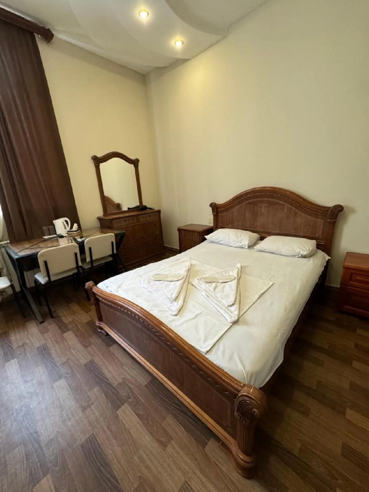 Bed in NEW BELLA HOTEL