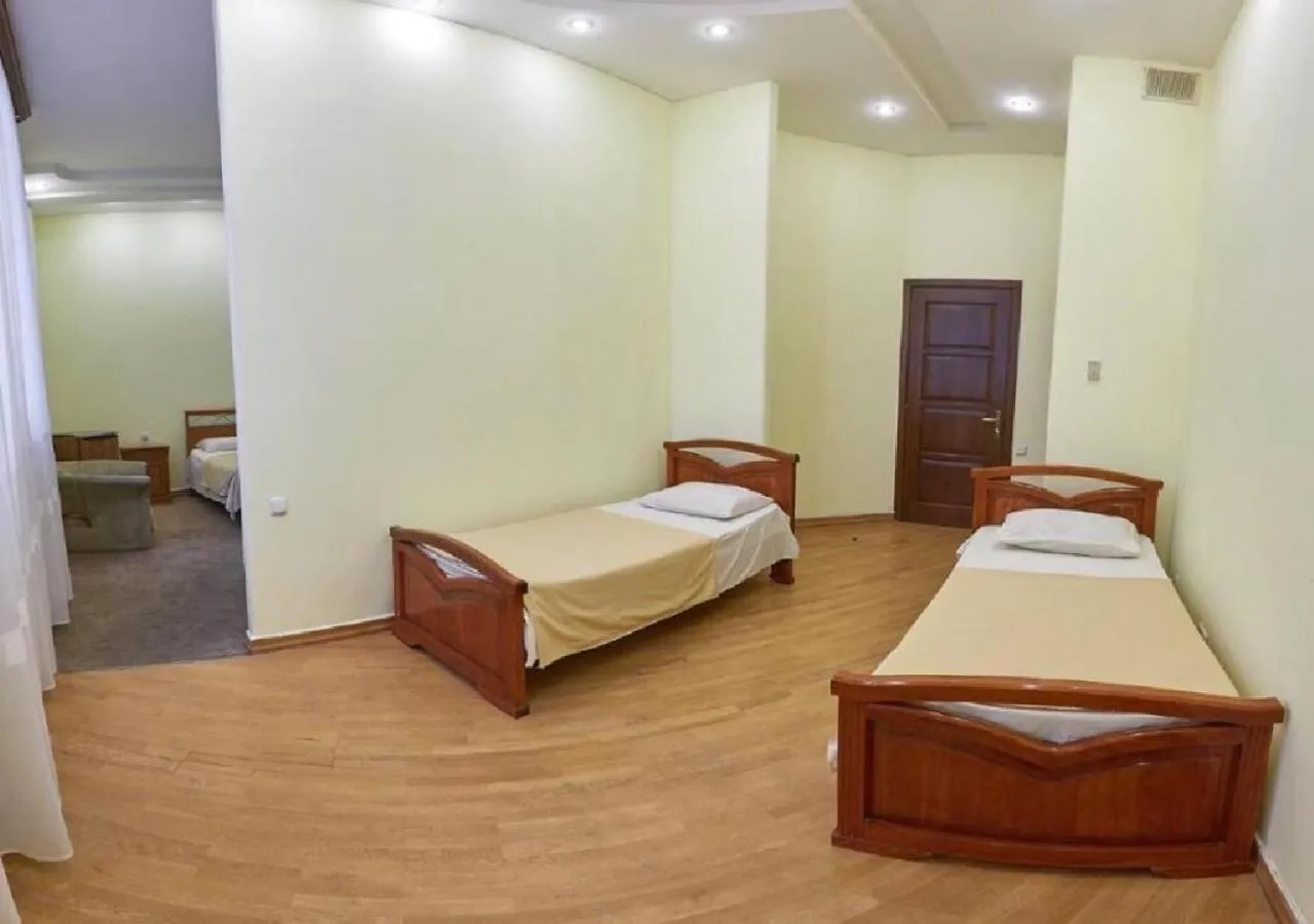 Bed in NEW BELLA HOTEL