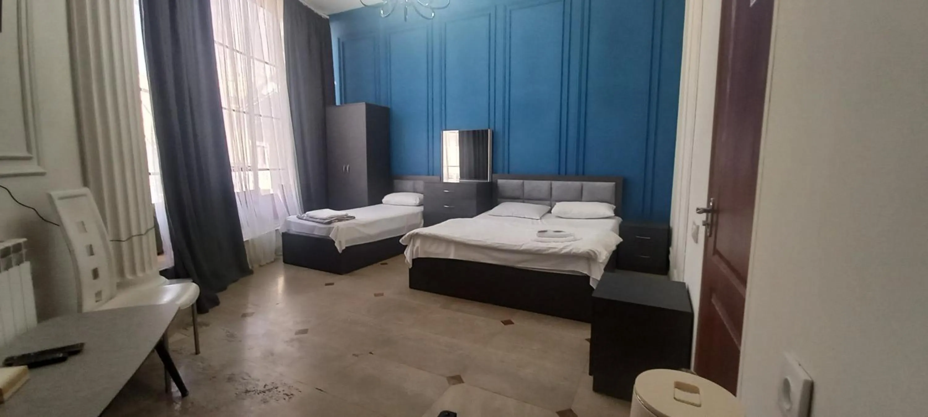 Bed in NEW BELLA HOTEL