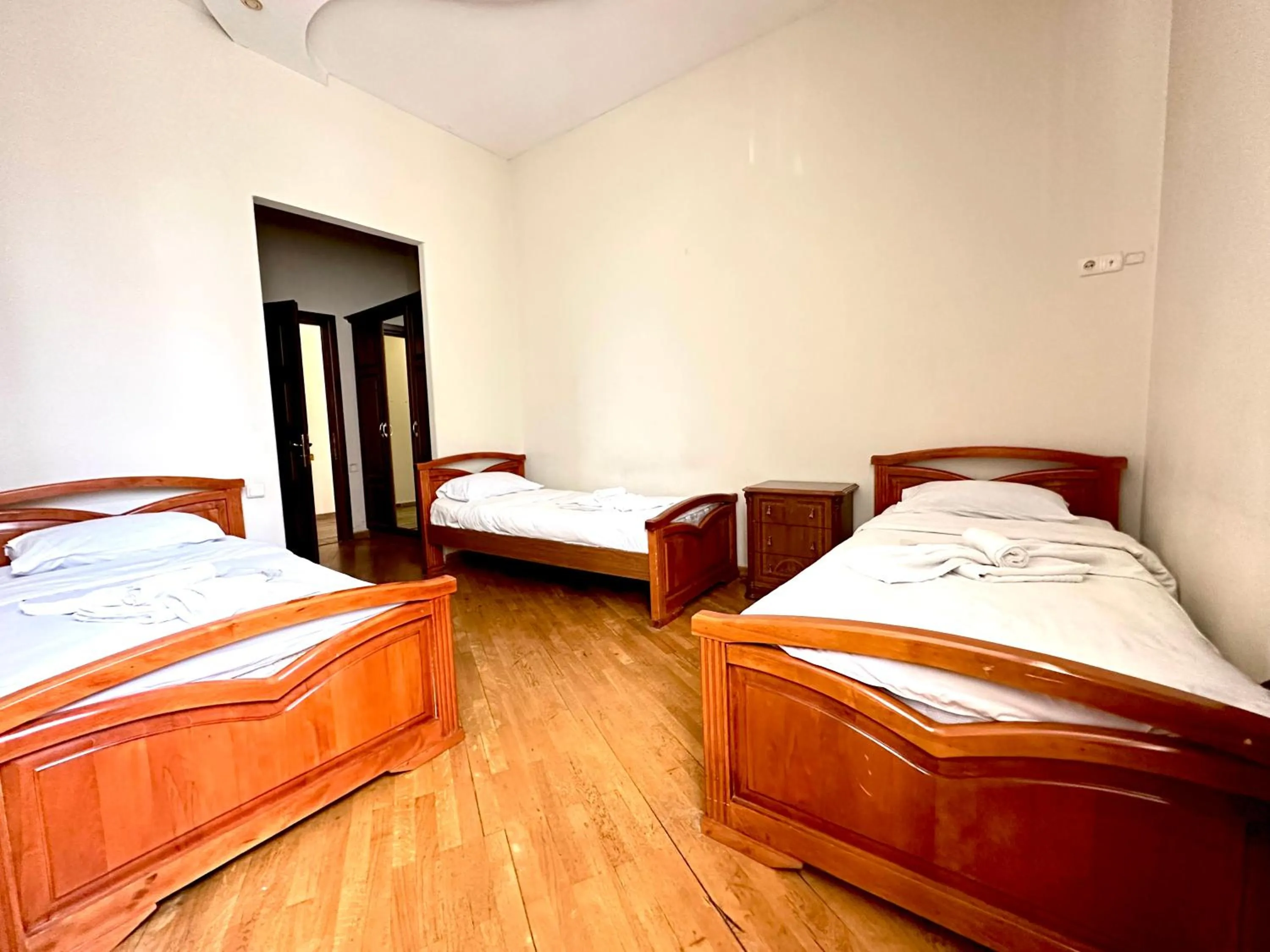 Bed in NEW BELLA HOTEL