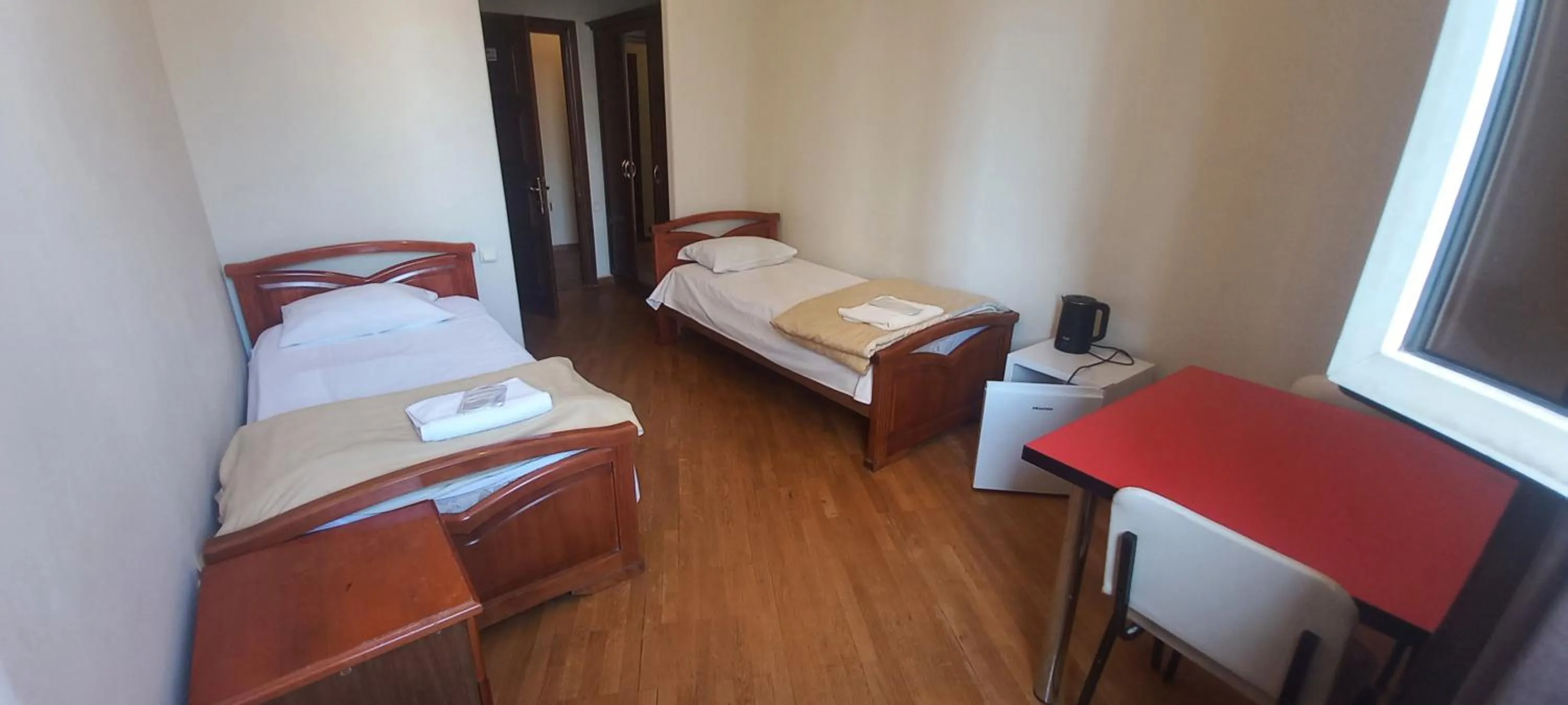 Bed in NEW BELLA HOTEL