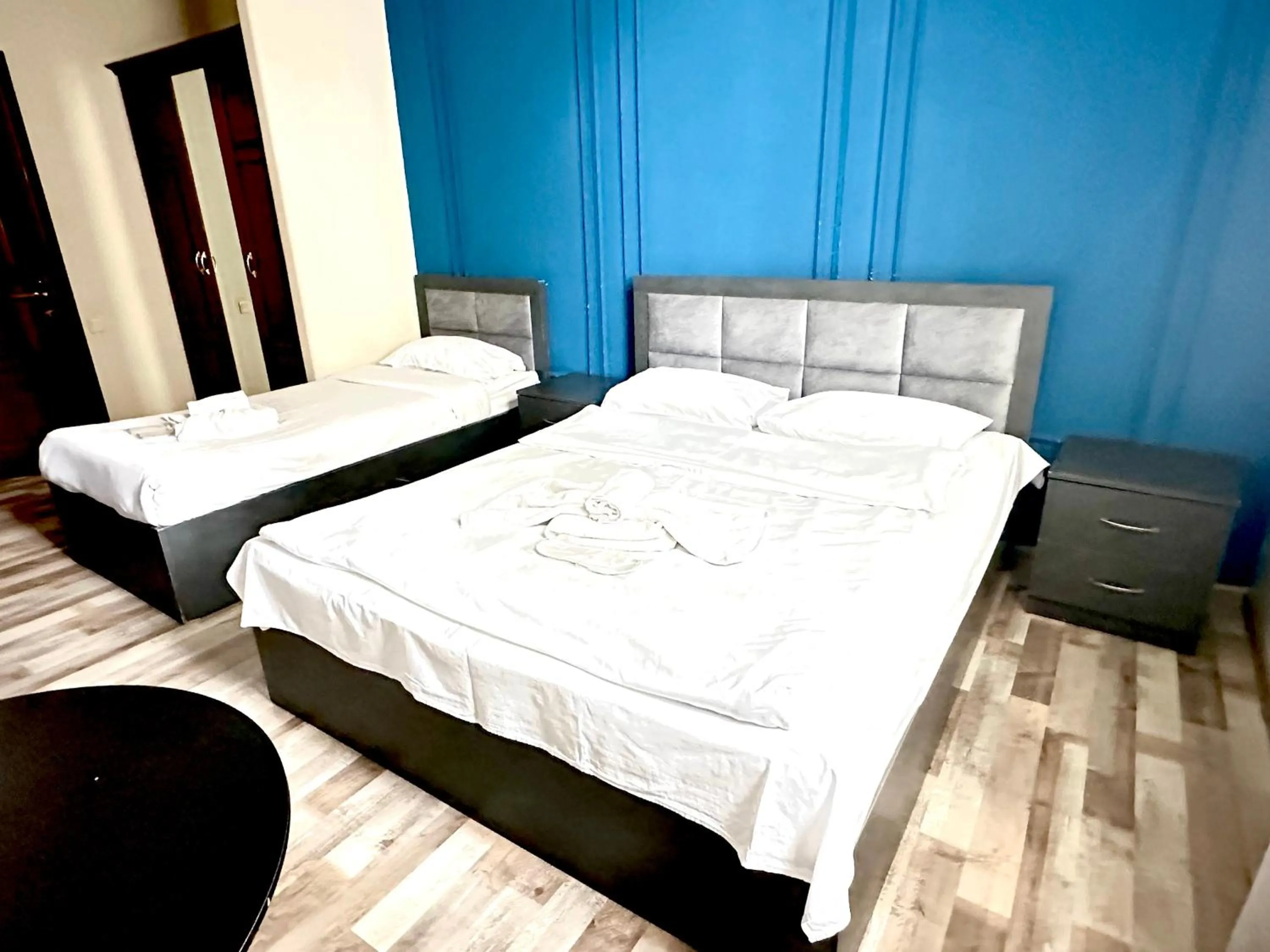 Bed in NEW BELLA HOTEL