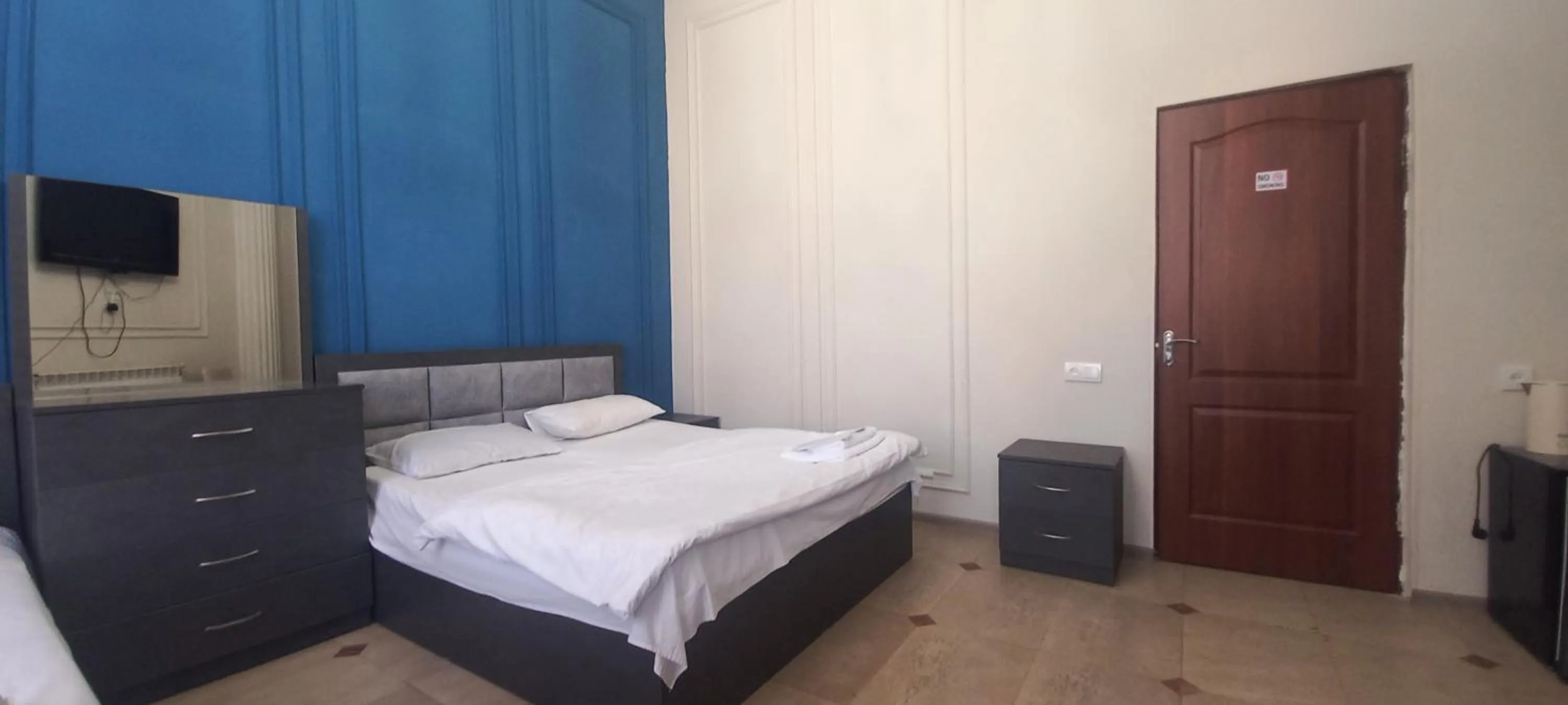 Bed in NEW BELLA HOTEL