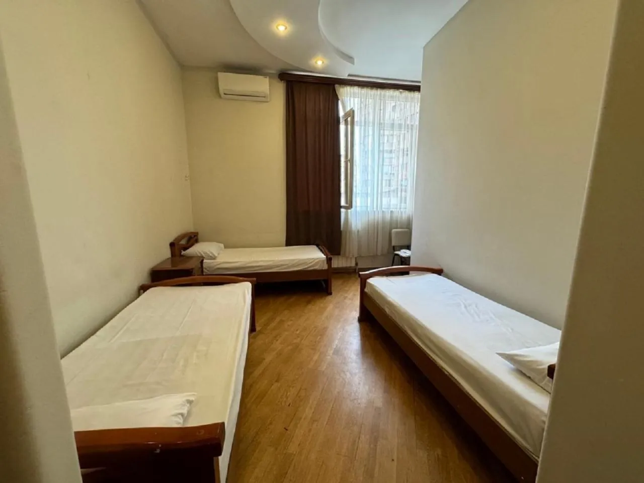 Bed in NEW BELLA HOTEL