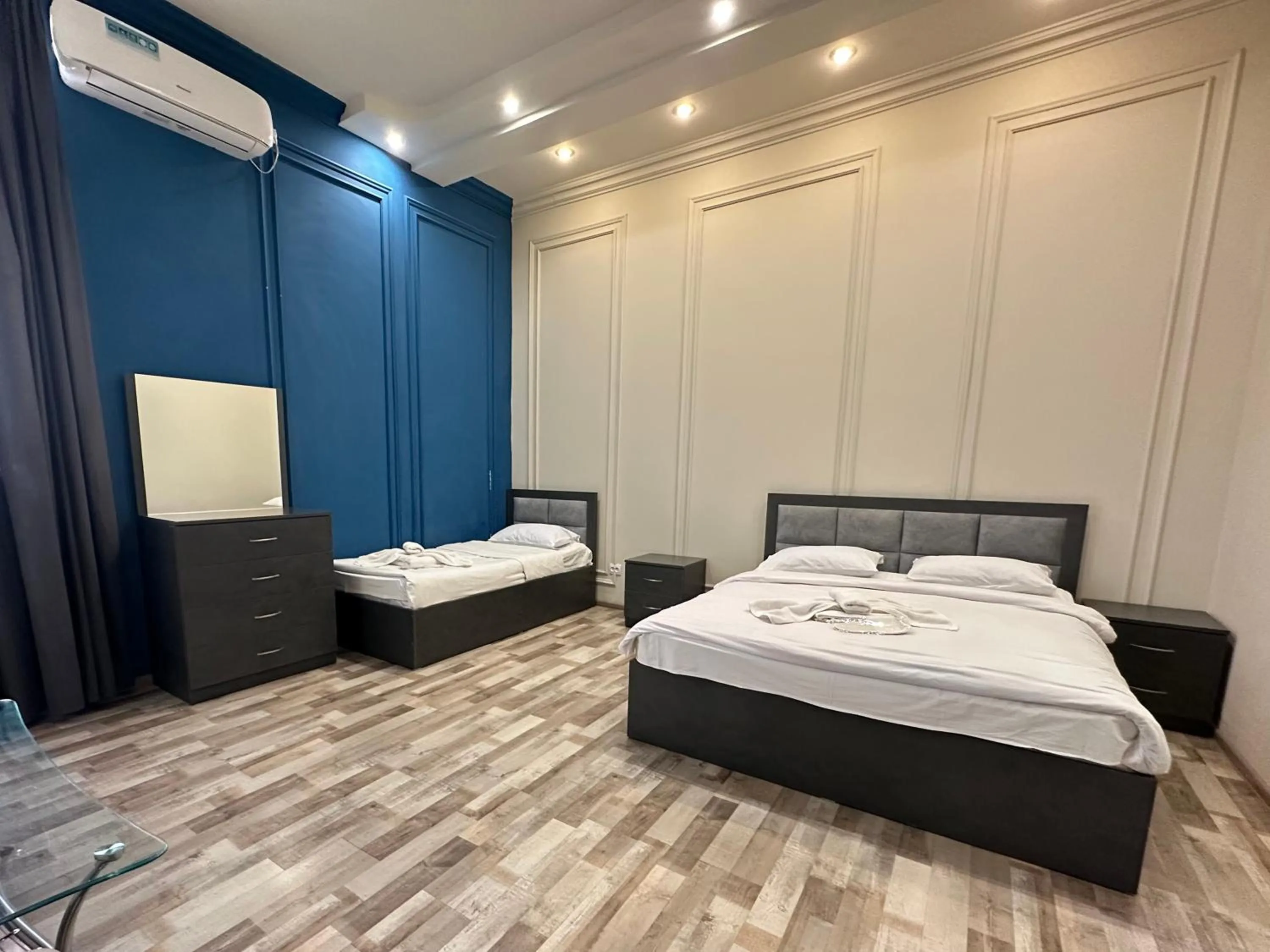 Bed in NEW BELLA HOTEL