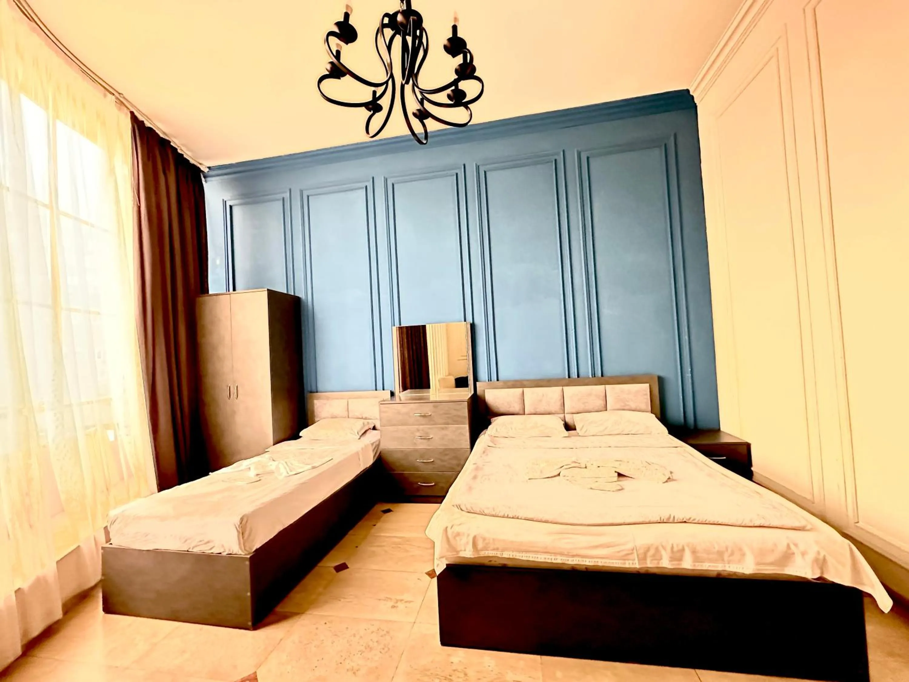 Bed in NEW BELLA HOTEL