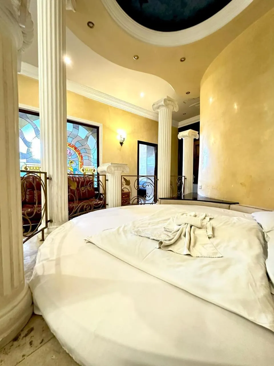 Bed in NEW BELLA HOTEL