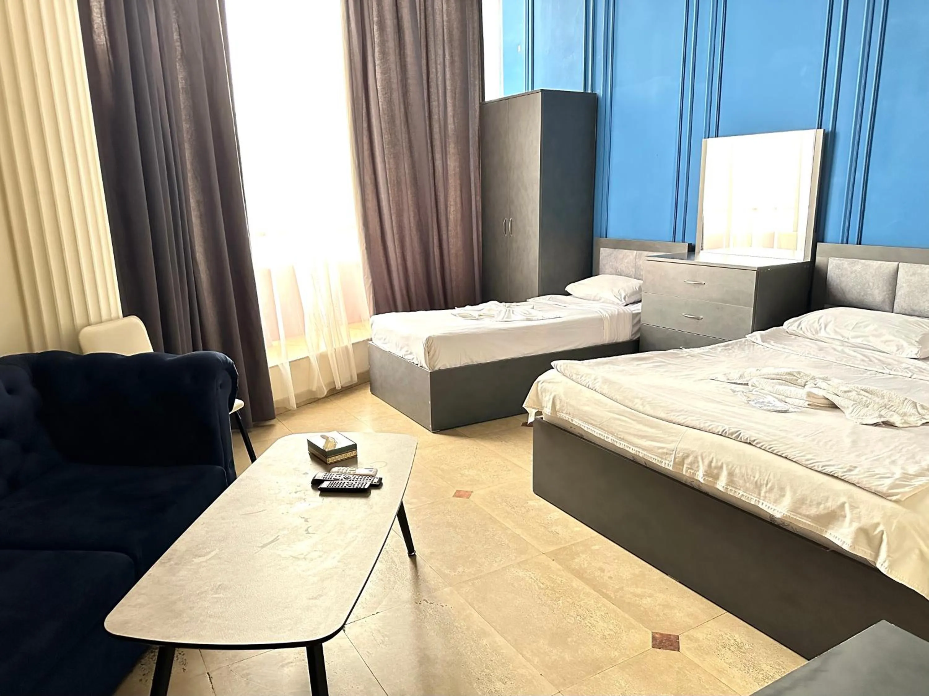 Bed in NEW BELLA HOTEL