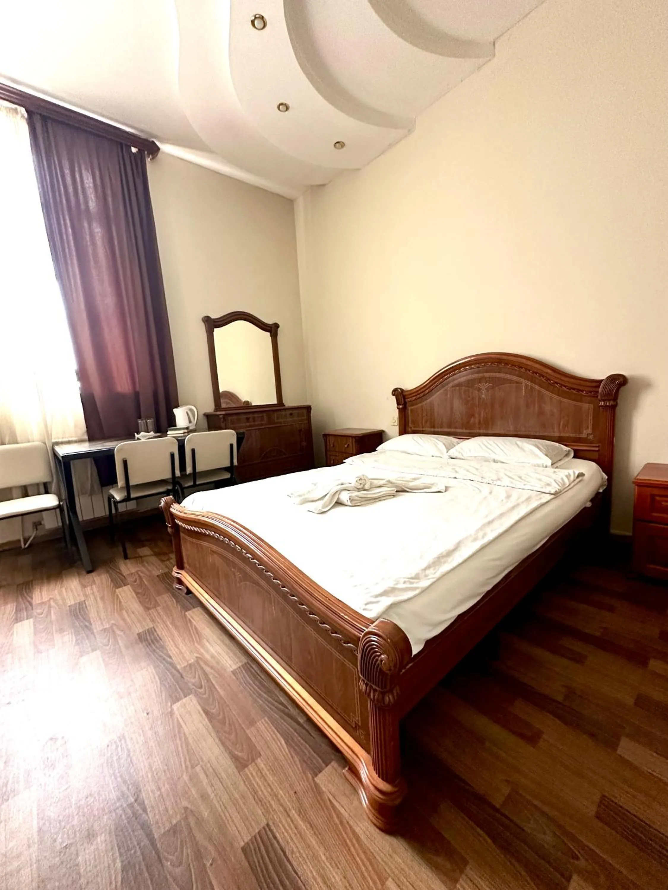 Bed in NEW BELLA HOTEL