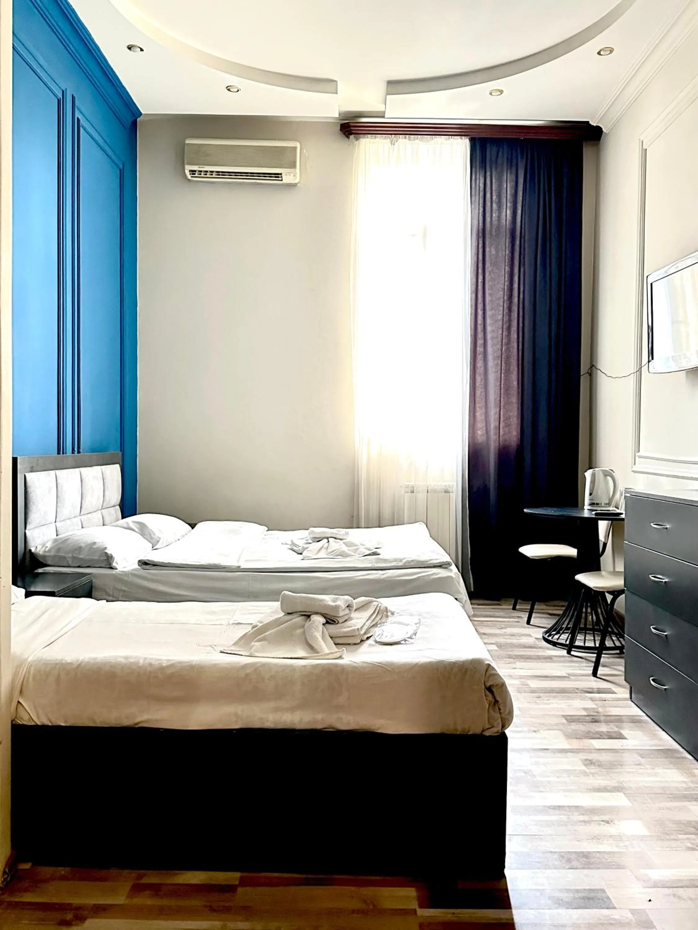 Bed in NEW BELLA HOTEL