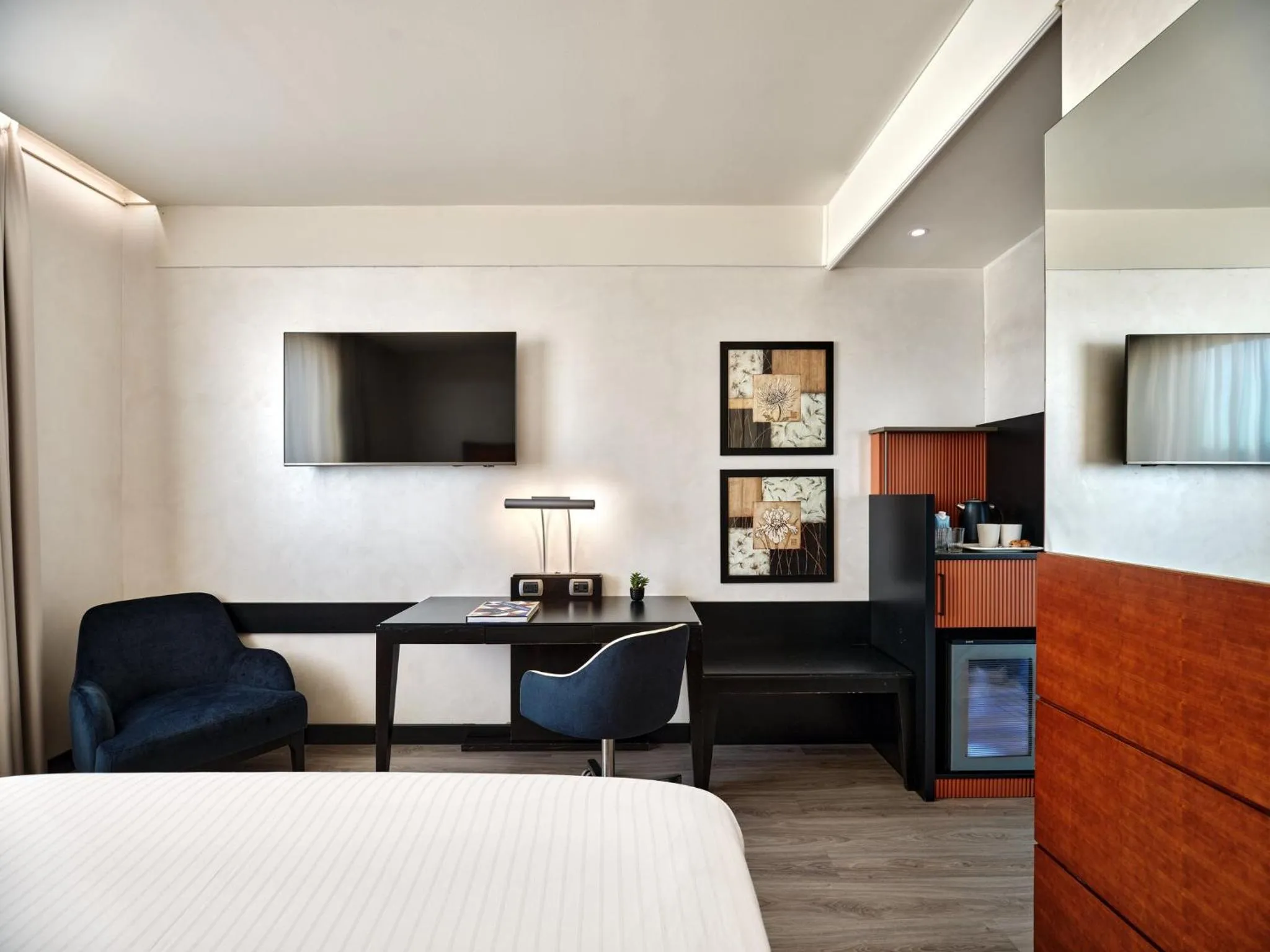 Photo of the whole room, Bed in Crowne Plaza Milan - Malpensa Airport by IHG