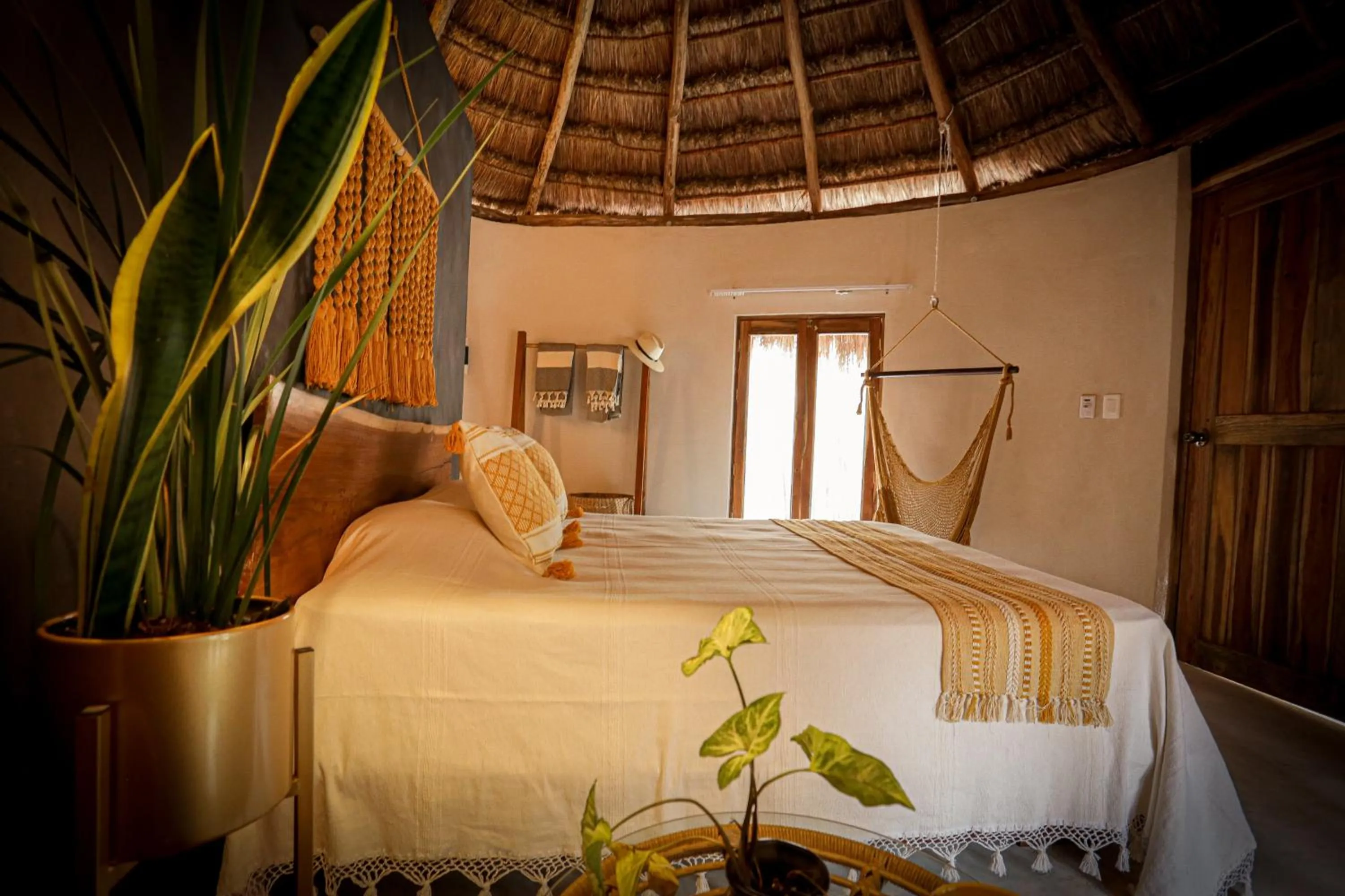 Bed in The Yellow Nest Tulum