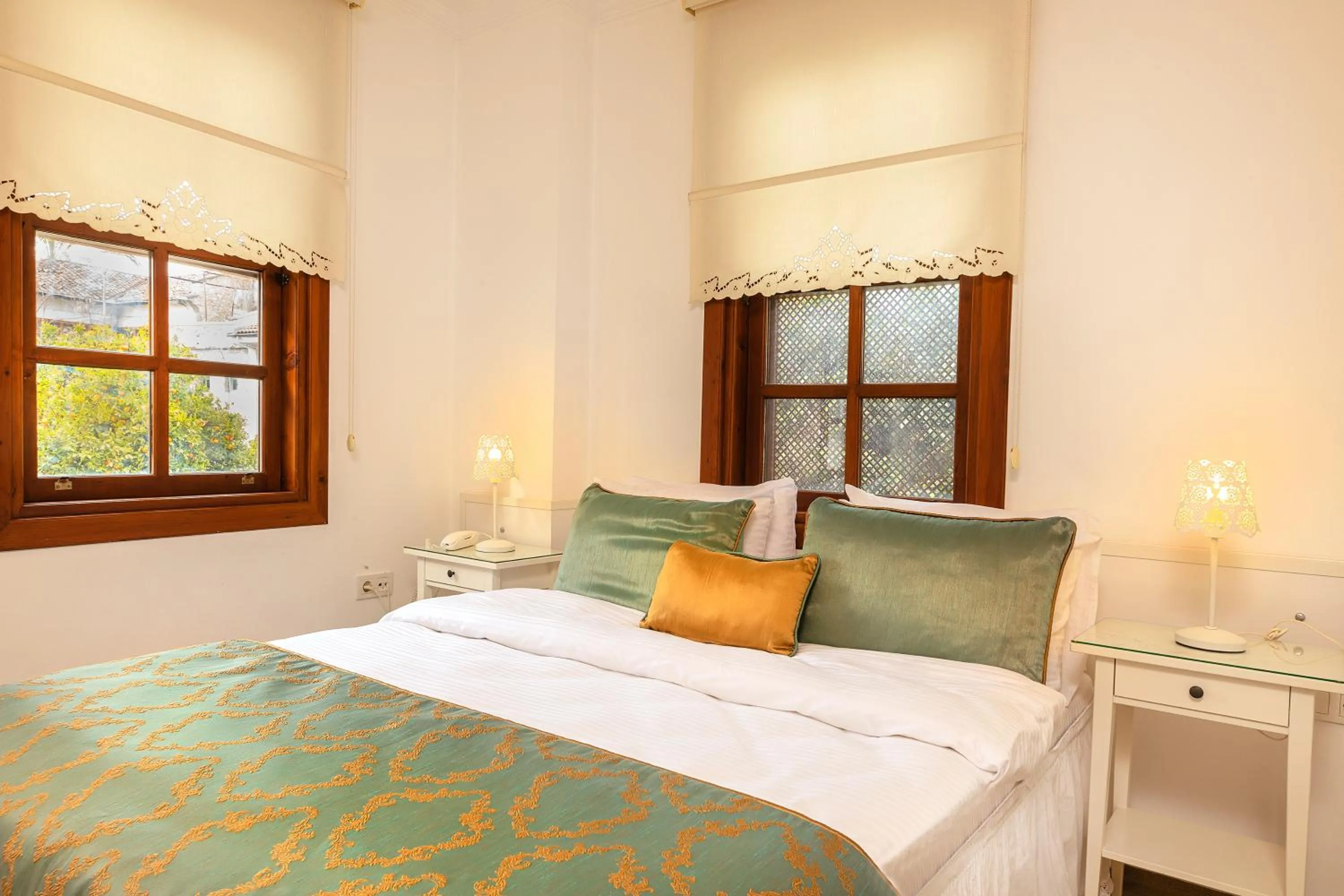 Bed in Zemira Garden Hotel