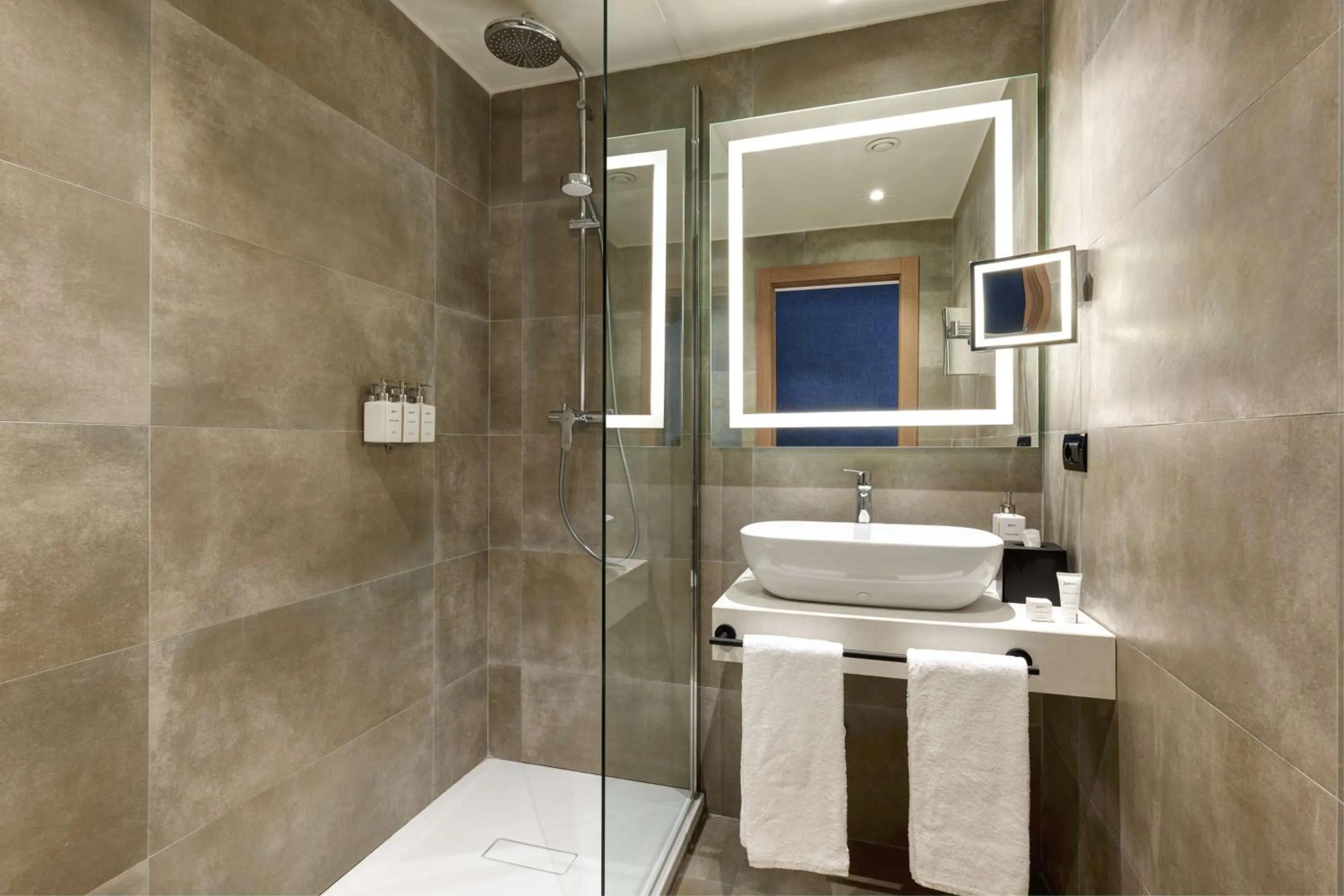 Bathroom in Radisson Hotel Ferrara