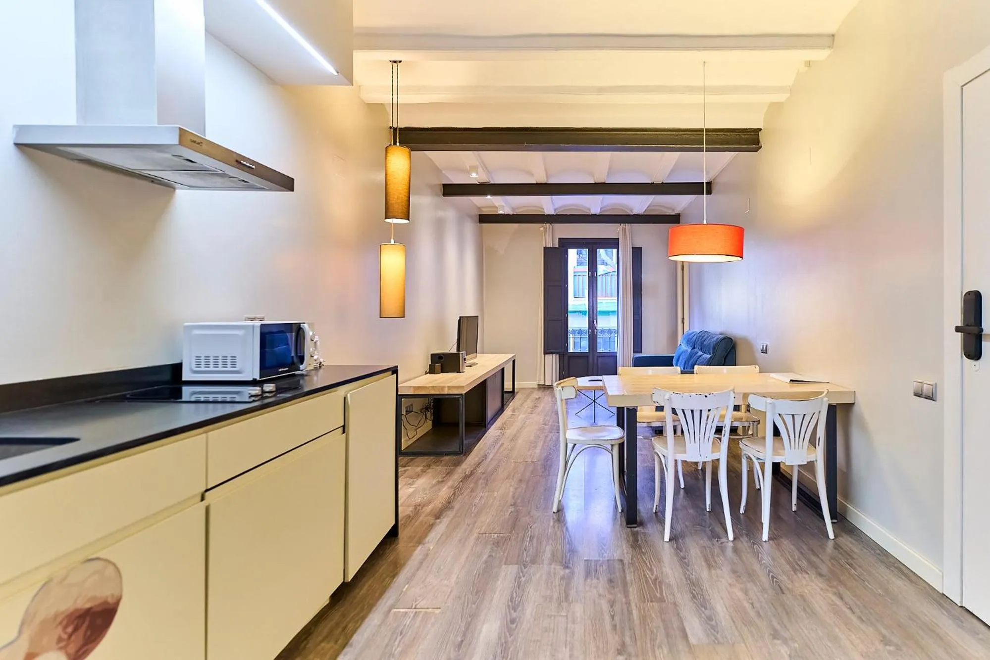 Kitchen or kitchenette in Montserrat Apartments by gaiarooms