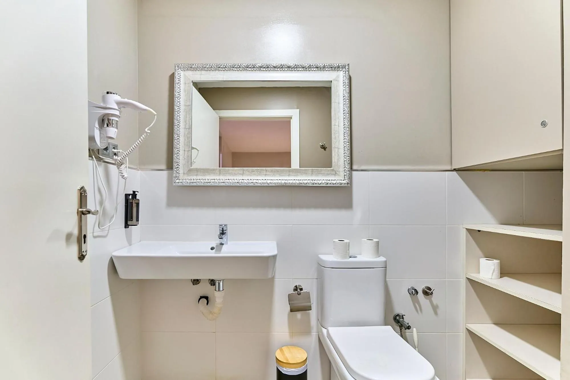 Toilet in Montserrat Apartments by gaiarooms