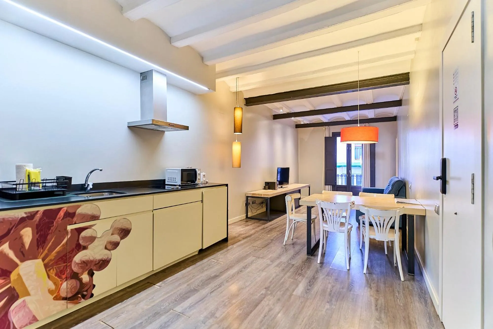 Kitchen or kitchenette in Montserrat Apartments by gaiarooms
