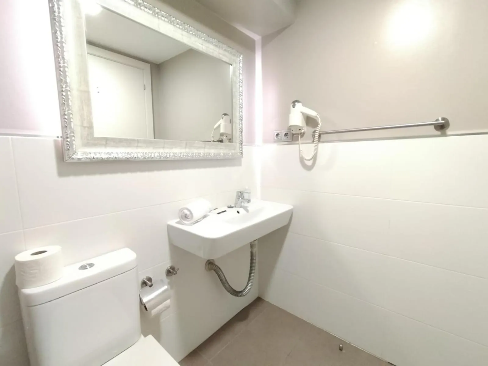 Bathroom in Montserrat Apartments by gaiarooms