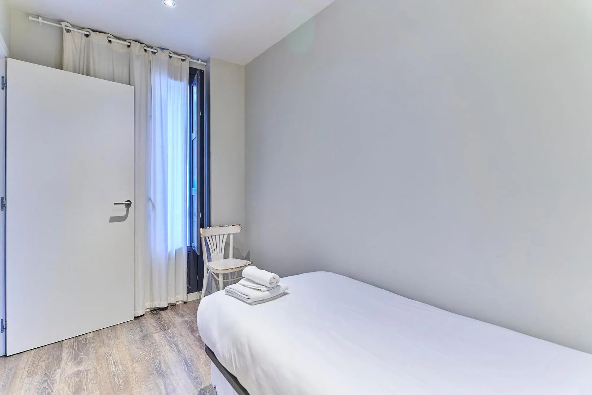 Bed in Montserrat Apartments by gaiarooms