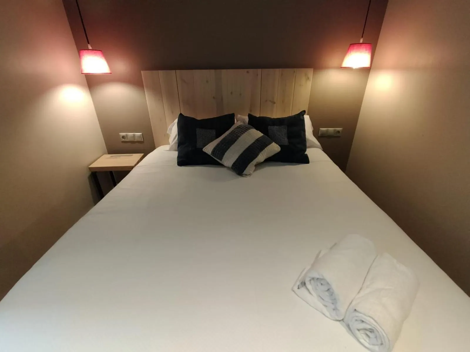 Bed in Montserrat Apartments by gaiarooms