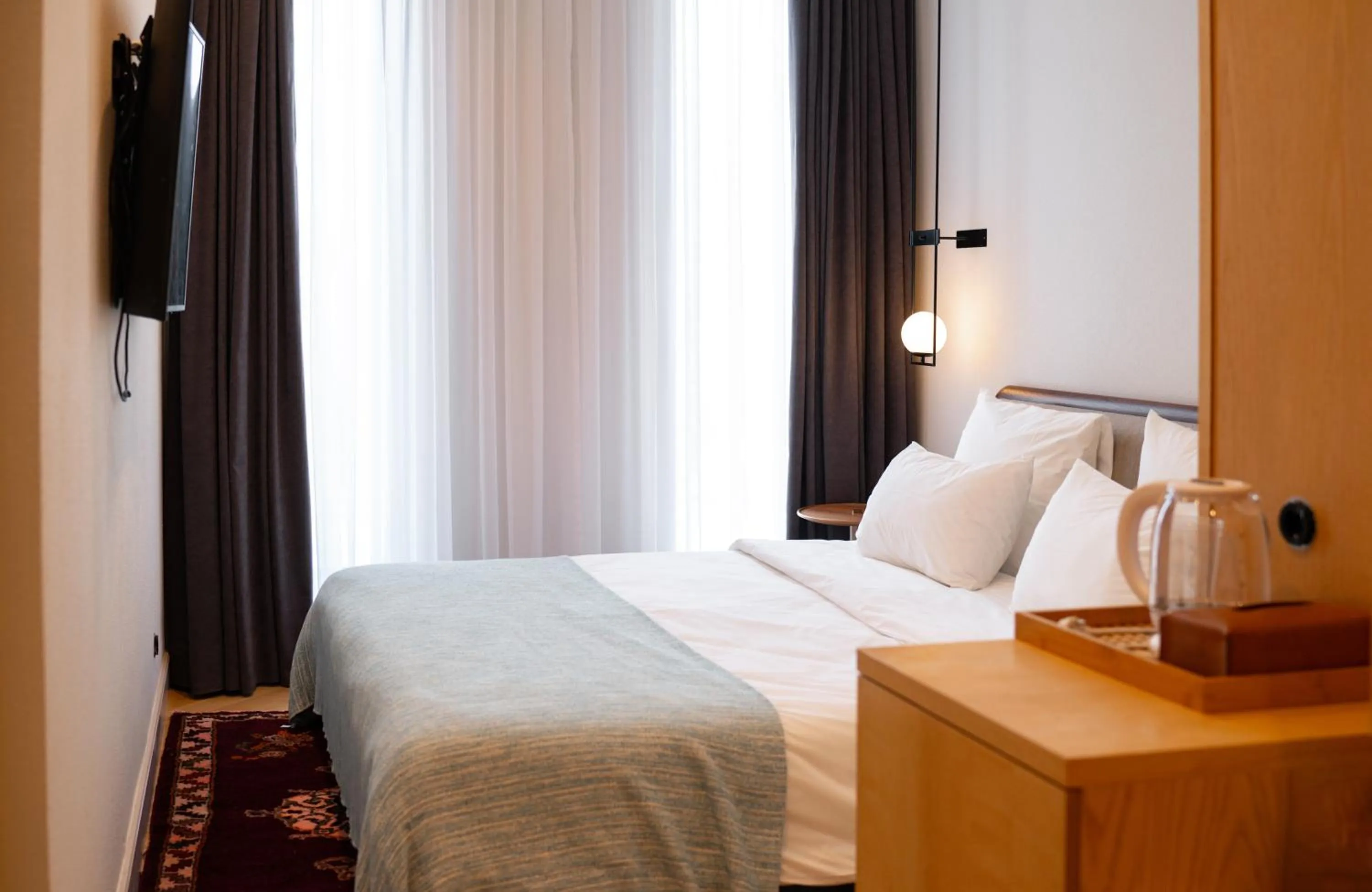 Bed in Pana Boutique Hotel