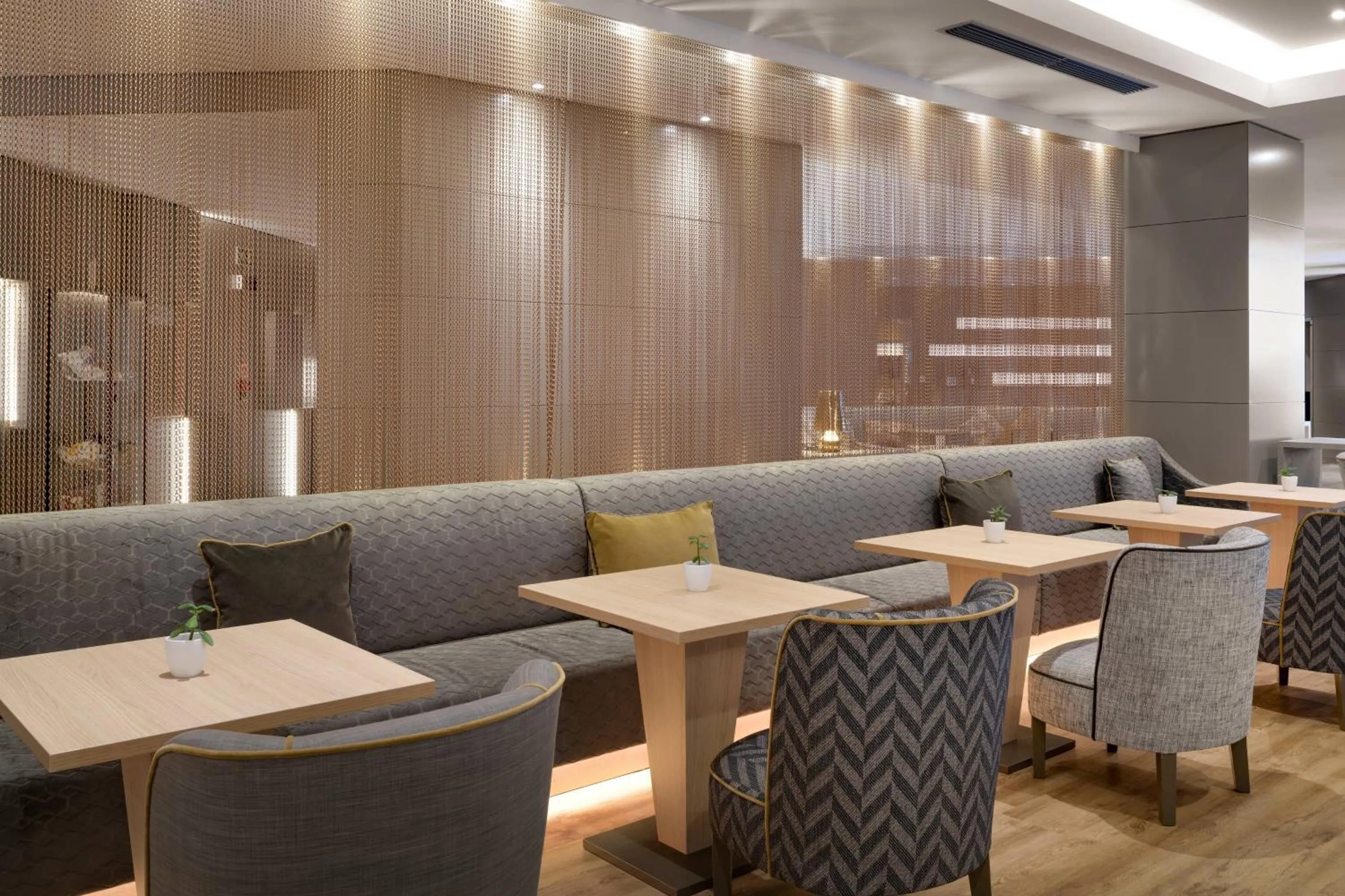 Lounge or bar in AC Hotel Genova by Marriott