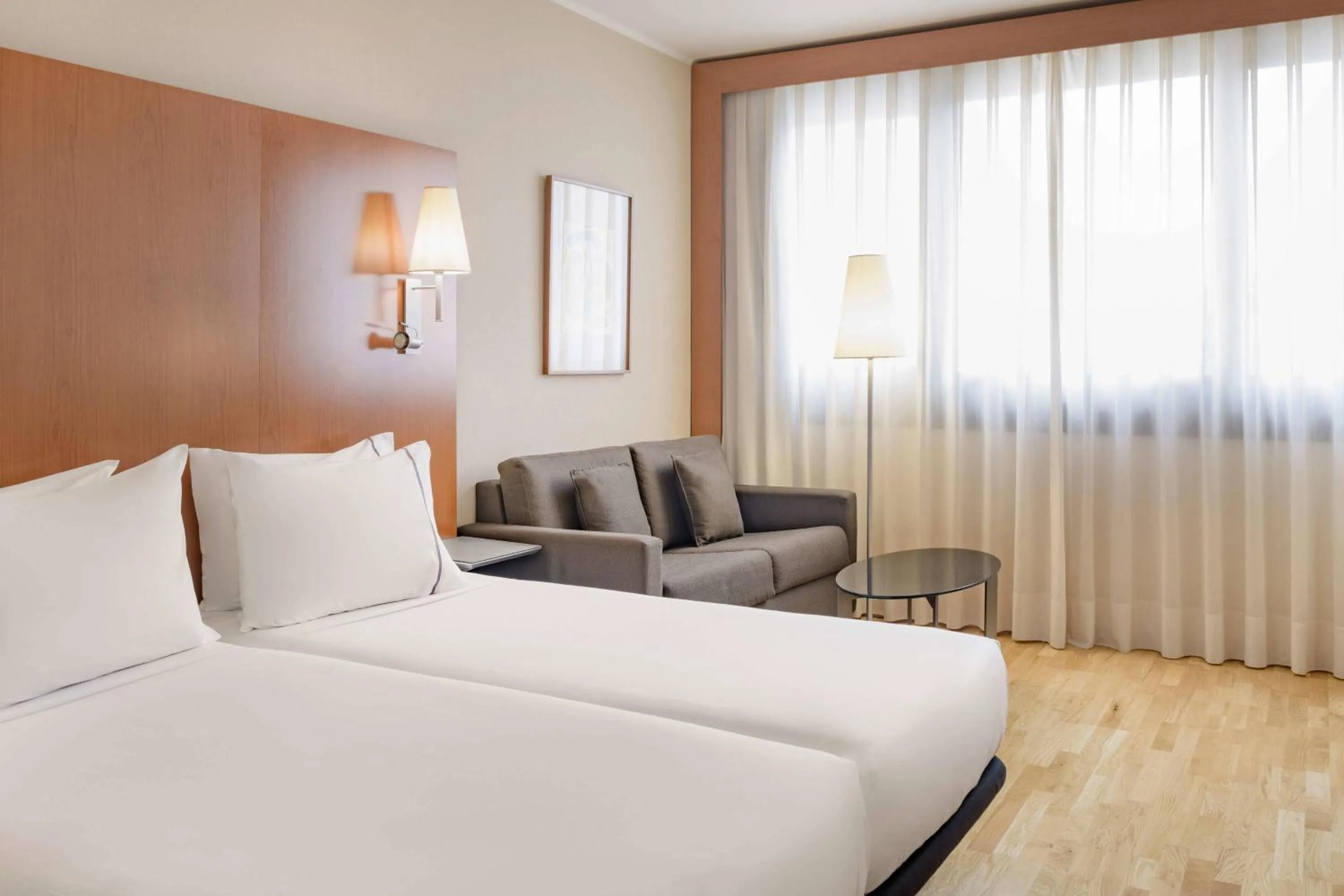 Photo of the whole room, Bed in AC Hotel Genova by Marriott