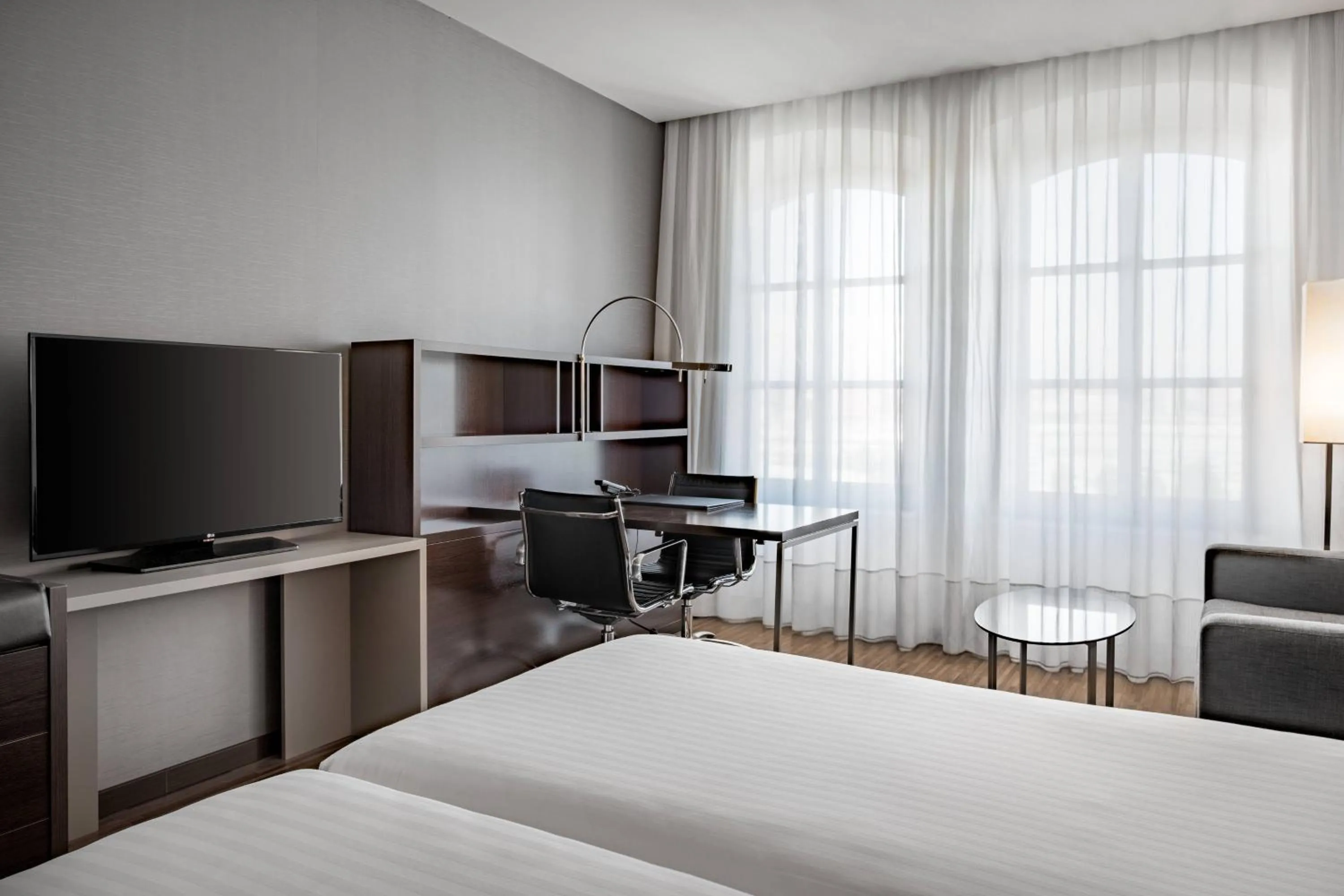 Photo of the whole room, Bed in AC Hotel Torino by Marriott