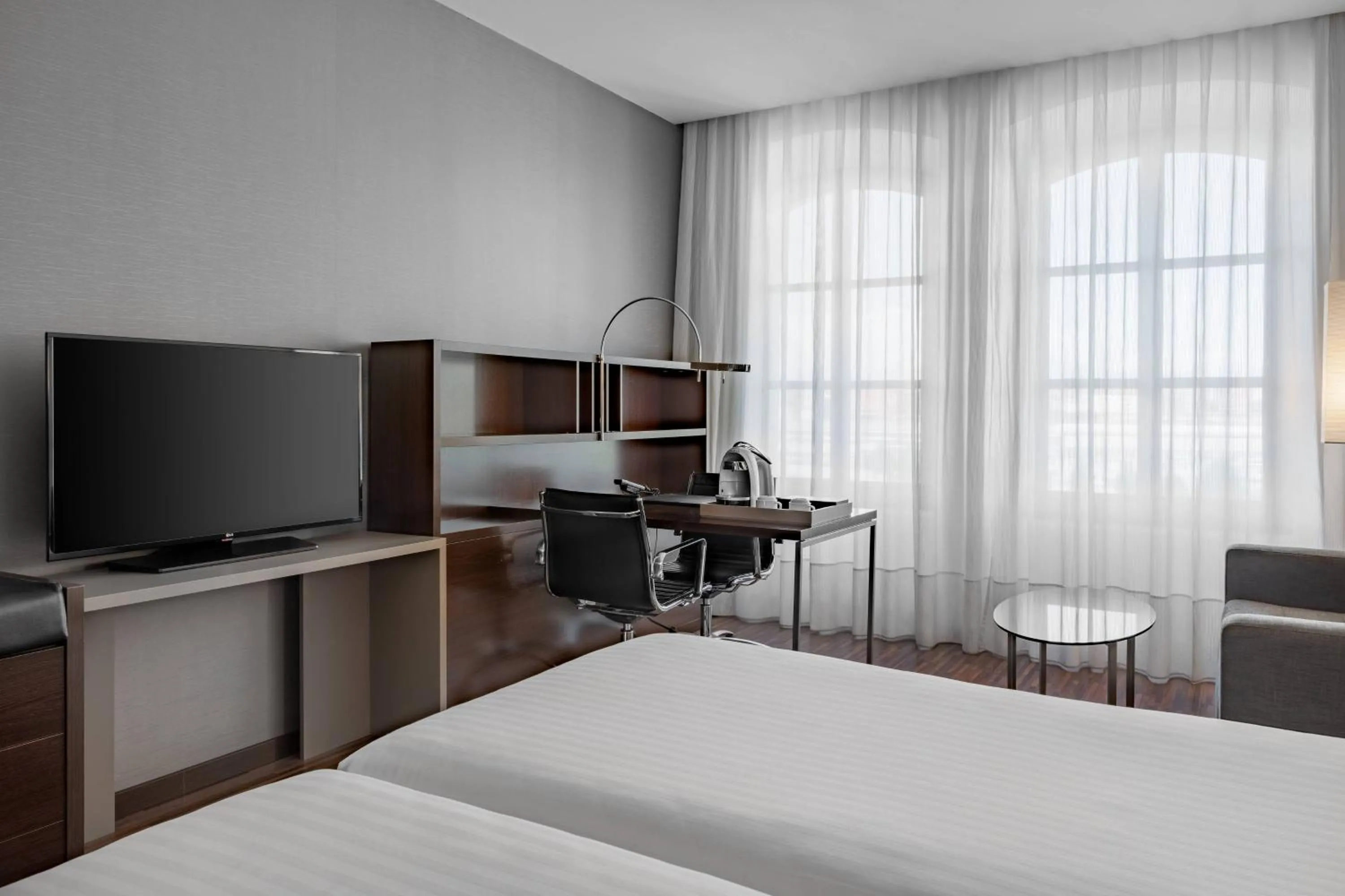 Photo of the whole room, Bed in AC Hotel Torino by Marriott