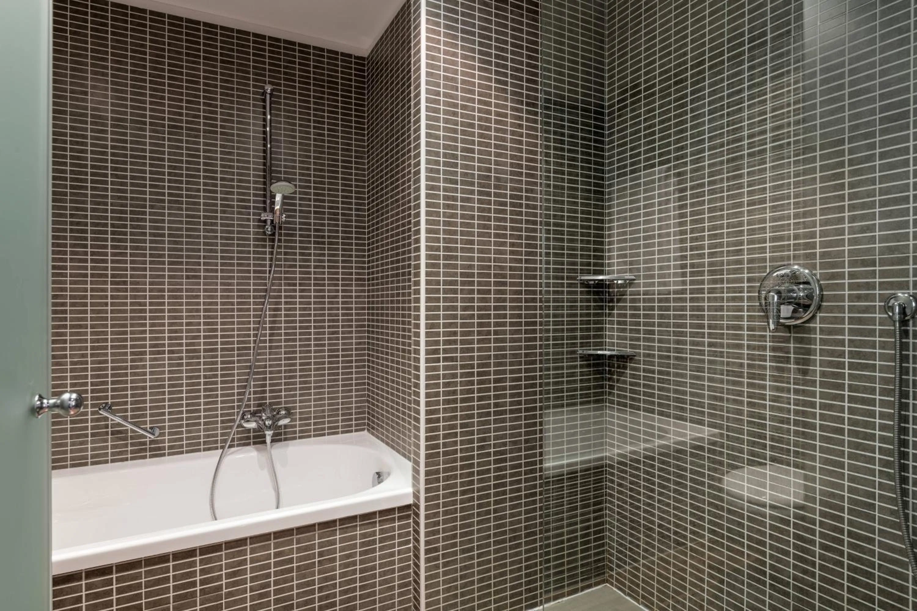 Bathroom in AC Hotel Bologna by Marriott