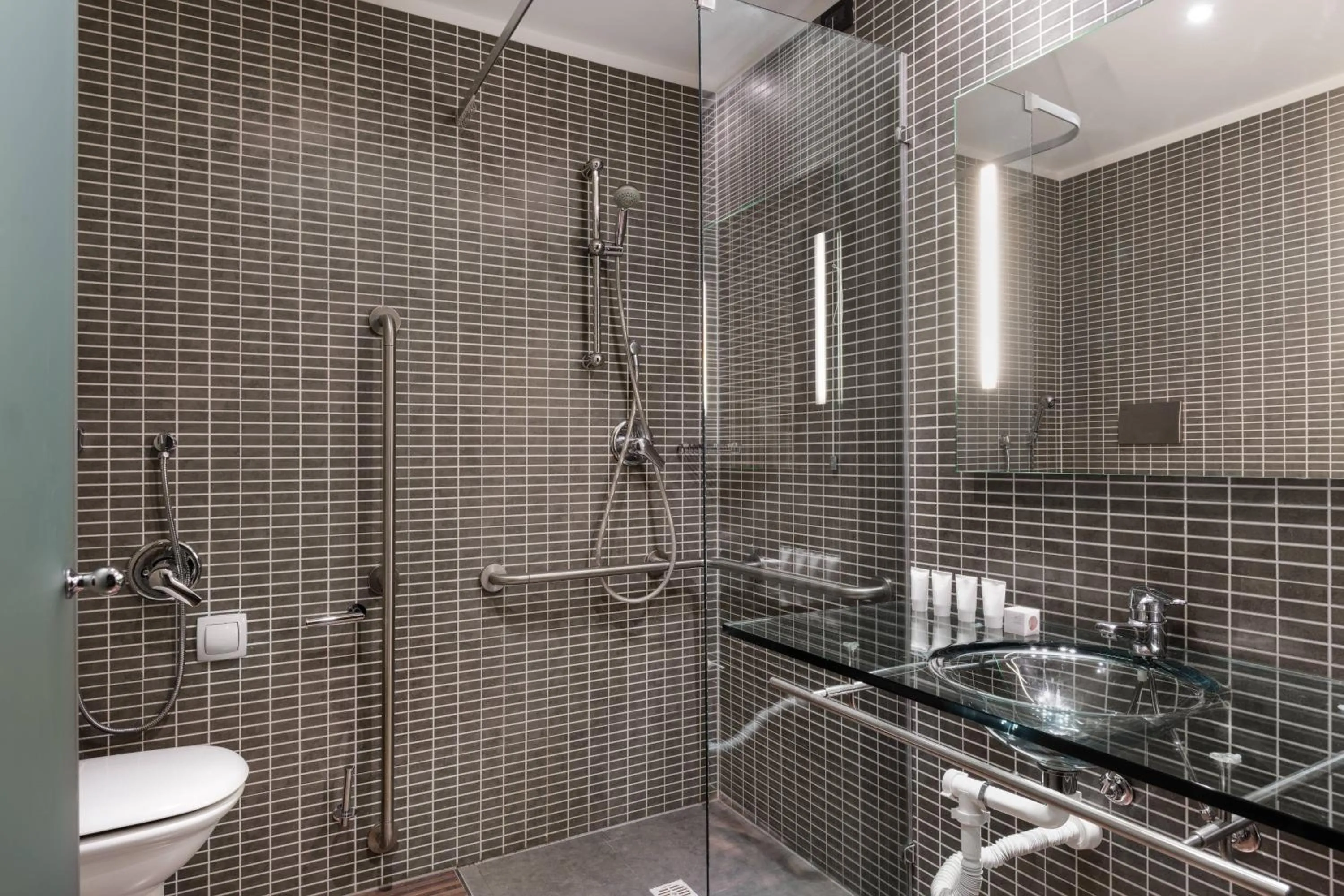 Bathroom in AC Hotel Bologna by Marriott