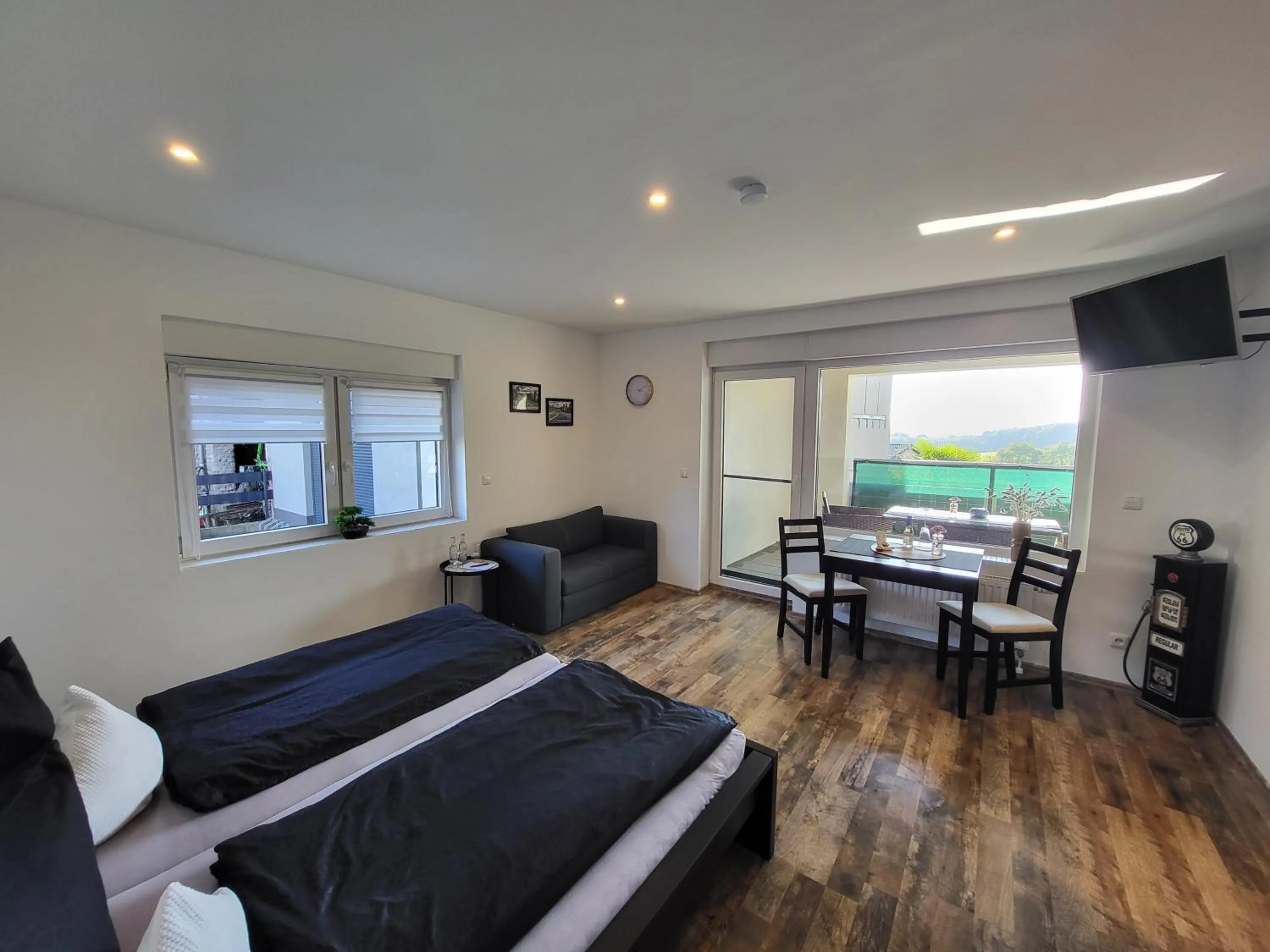 TV and multimedia in CJS Apartments - Chill or Drive am Nürburgring, Free Parking, WLan, Spacious Rooms, Quiet Location