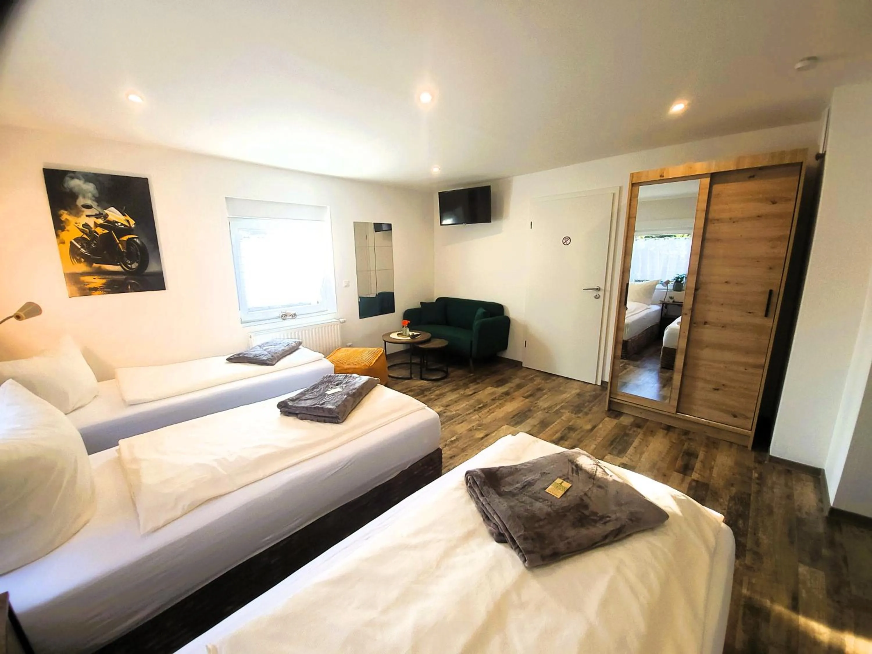 Photo of the whole room, Bed in CJS Apartments - Chill or Drive am Nürburgring, new Box Spring Beds, new furniture, WLan, Spacious Rooms, Quiet Location